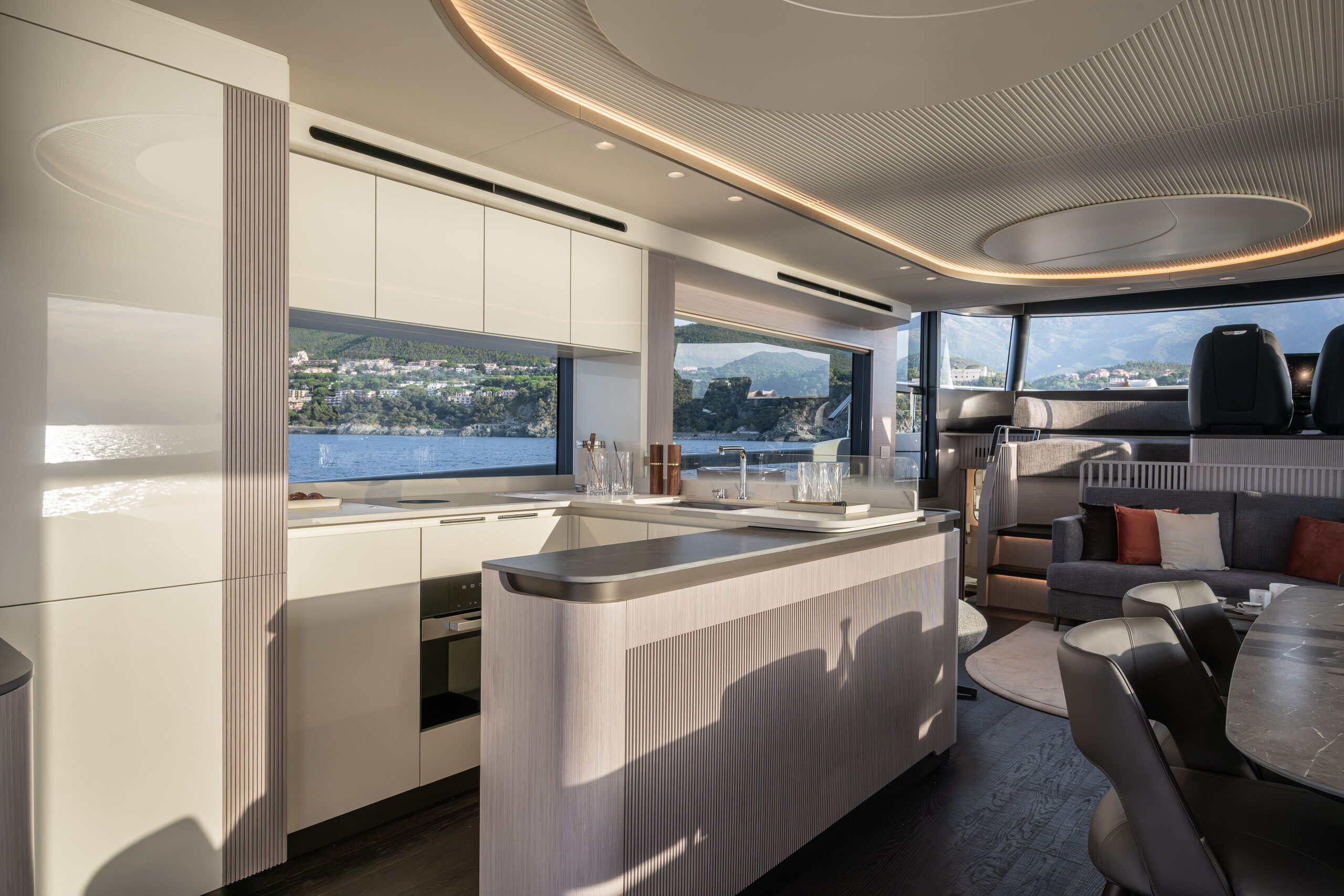 Navetta 66 galley separated by a low glass partition