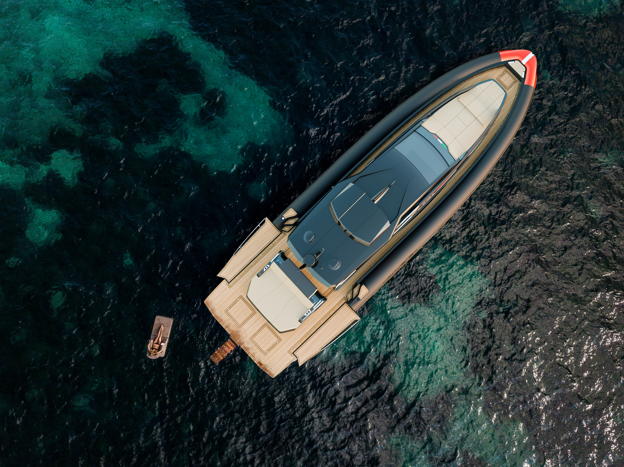 The Anvera 200 at rest on clear water seen from directly above