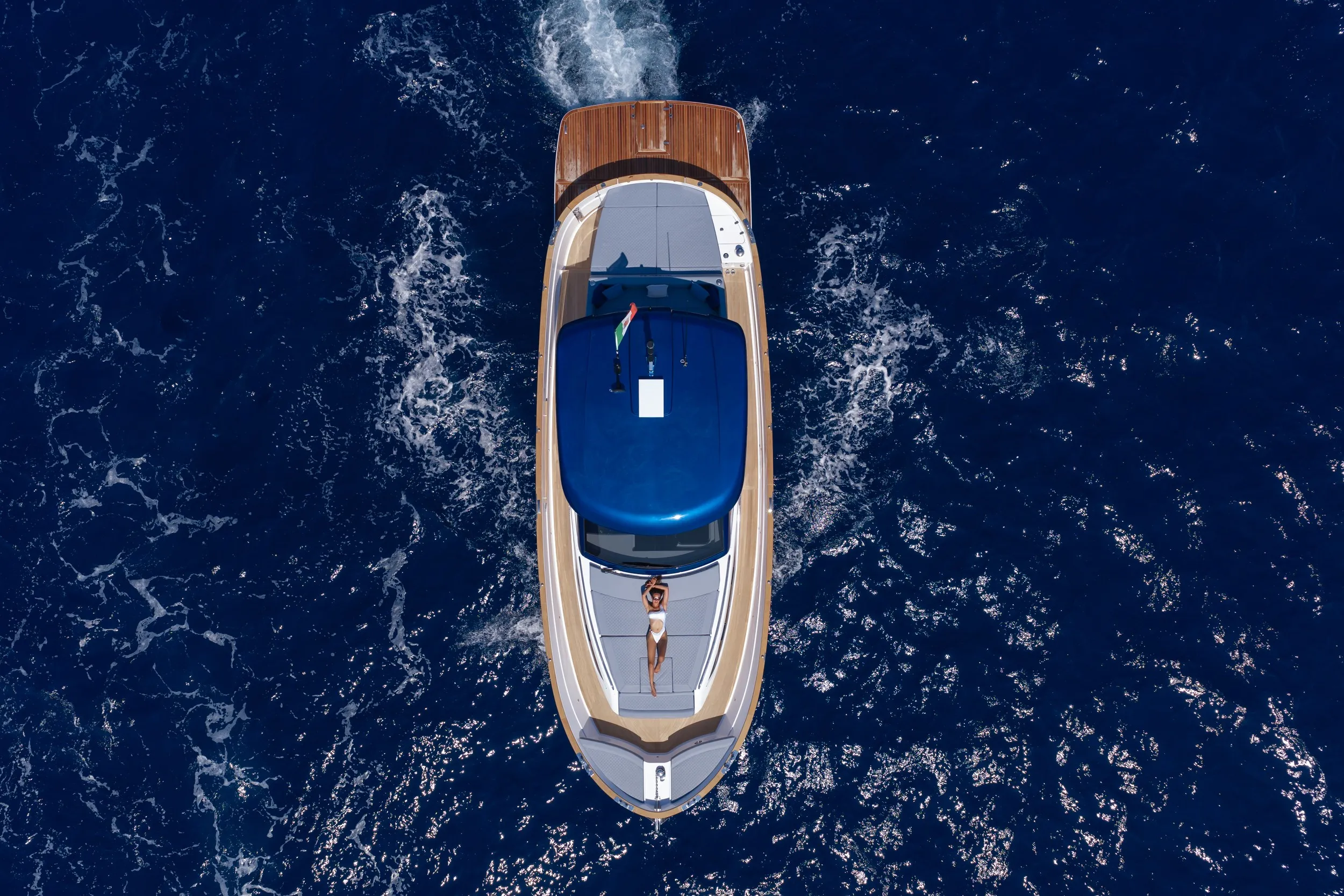 Overhead view of the Gozzo 42 on dark blue water