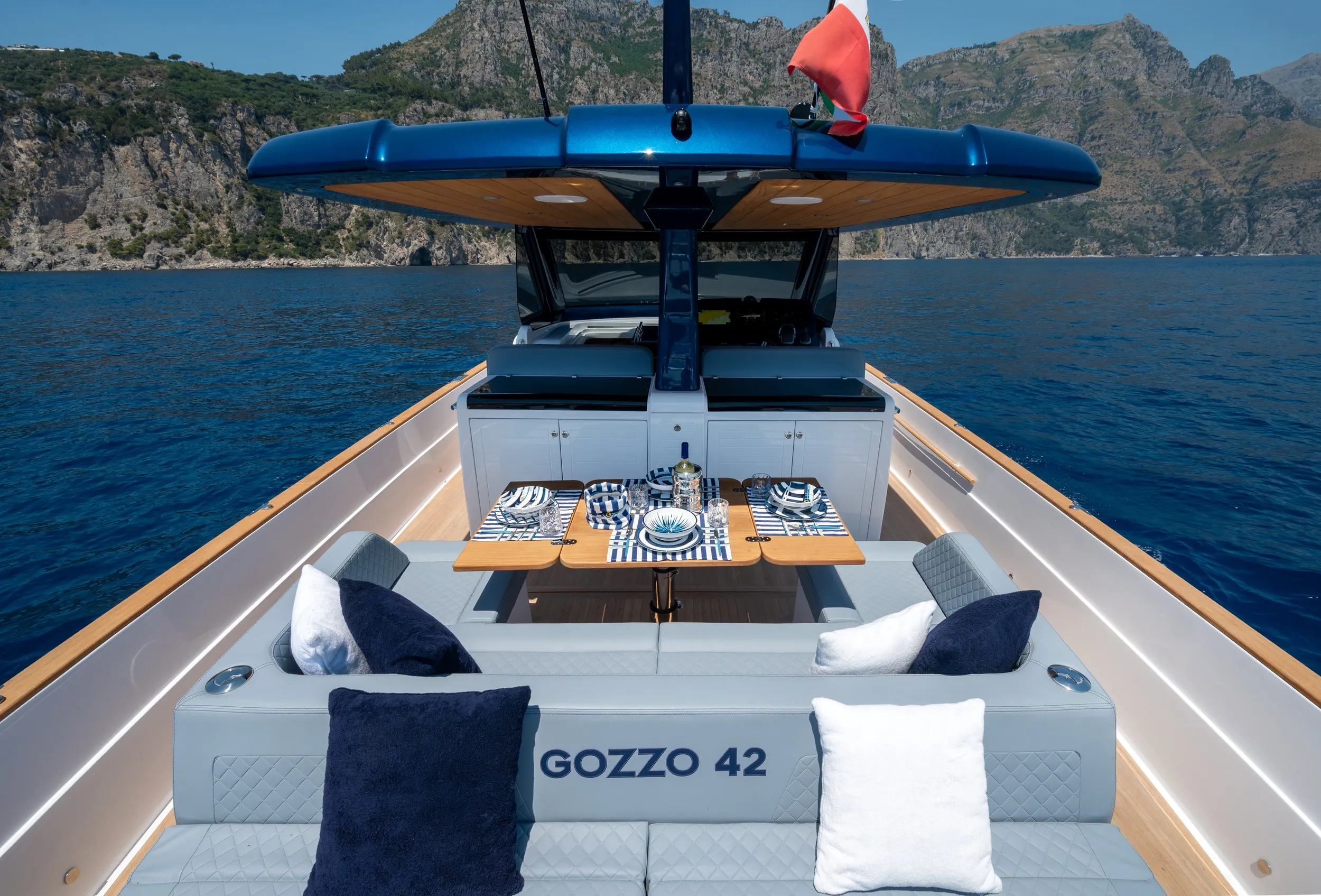 Cockpit seating and table with the Gozzo 42 name inlaid
