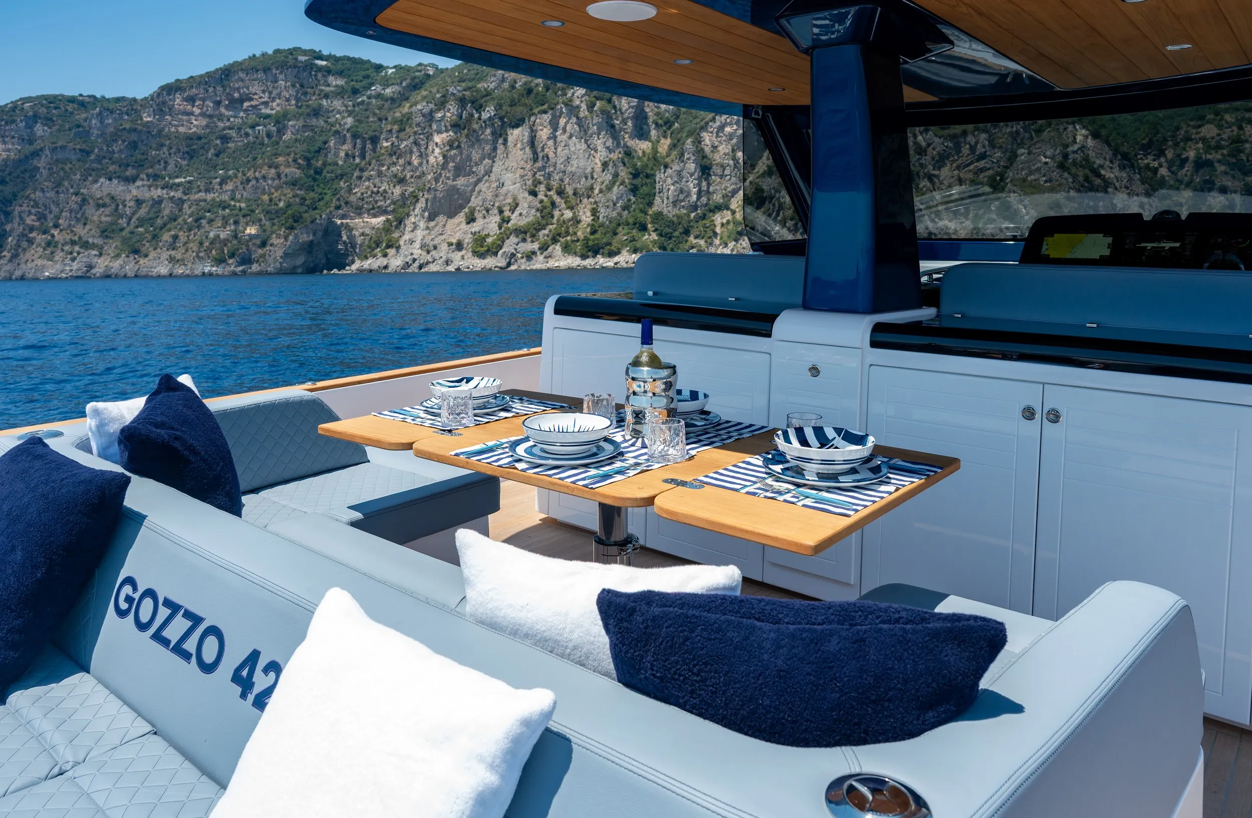 Cockpit table laid for lunch under the hard top