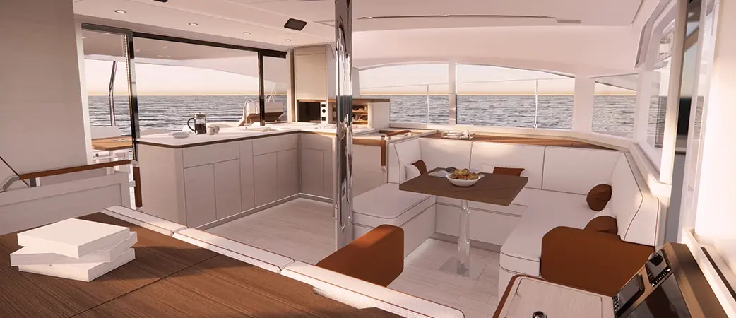 Salon and galley with dining seating and wide glazing