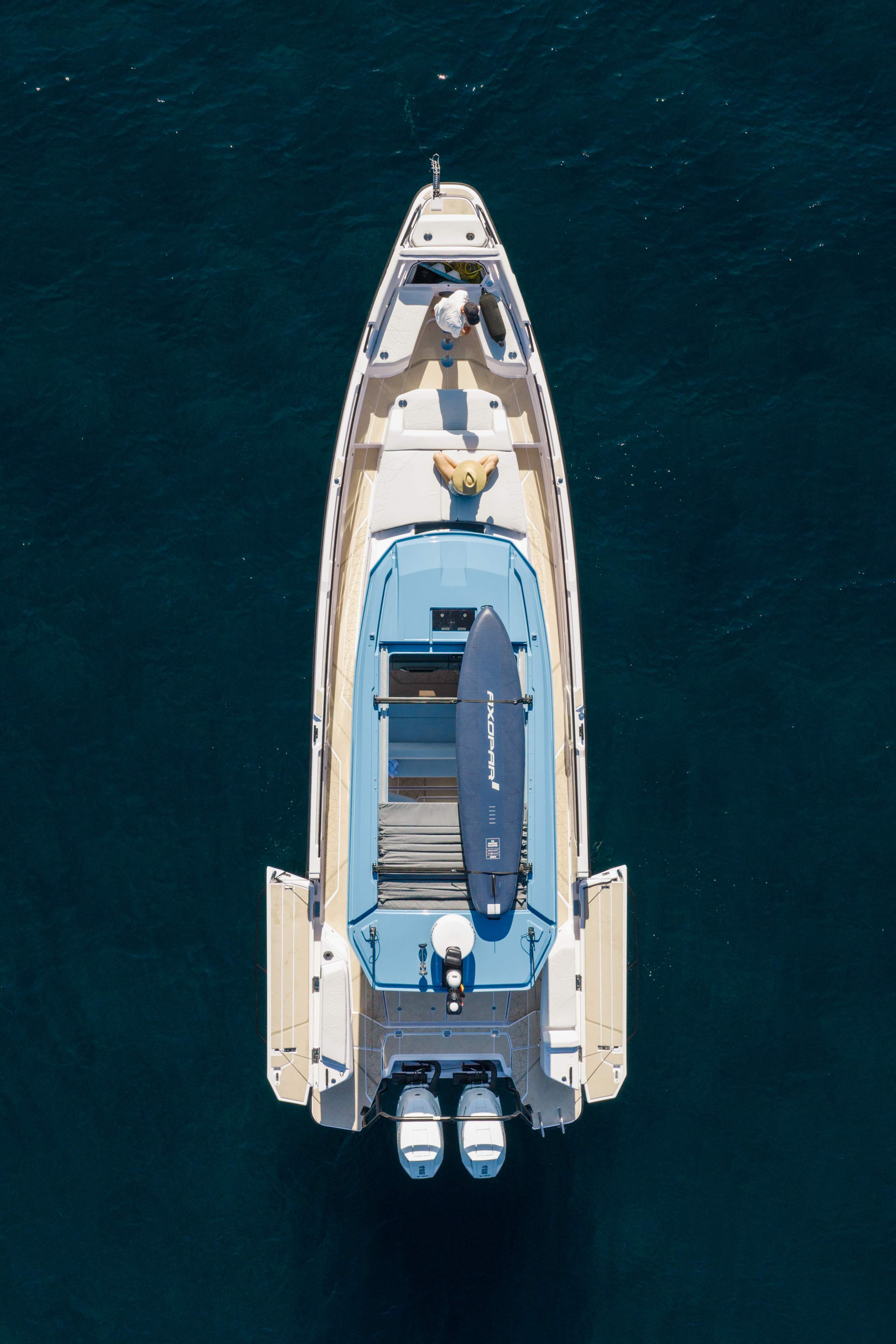 Overhead view of the 38 Cross Top at anchor on dark blue water