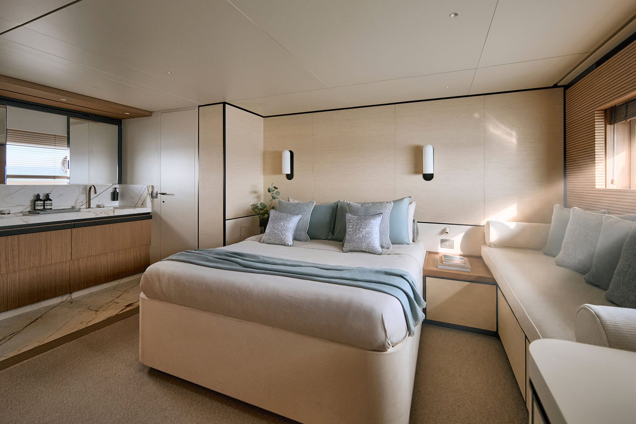 Owner’s suite with double bed and hull-side windows
