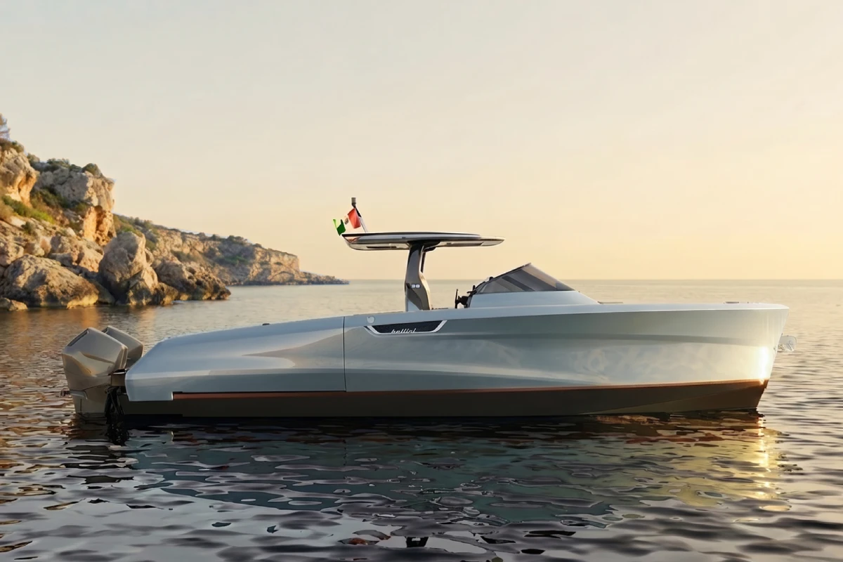 The Astor 38 Outboard in profile at rest, the twin outboards aft and a rocky shore behind.