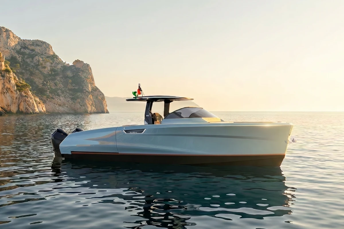 The Astor 38 Outboard from the bow quarter at rest, the Italian flag at the T-top.