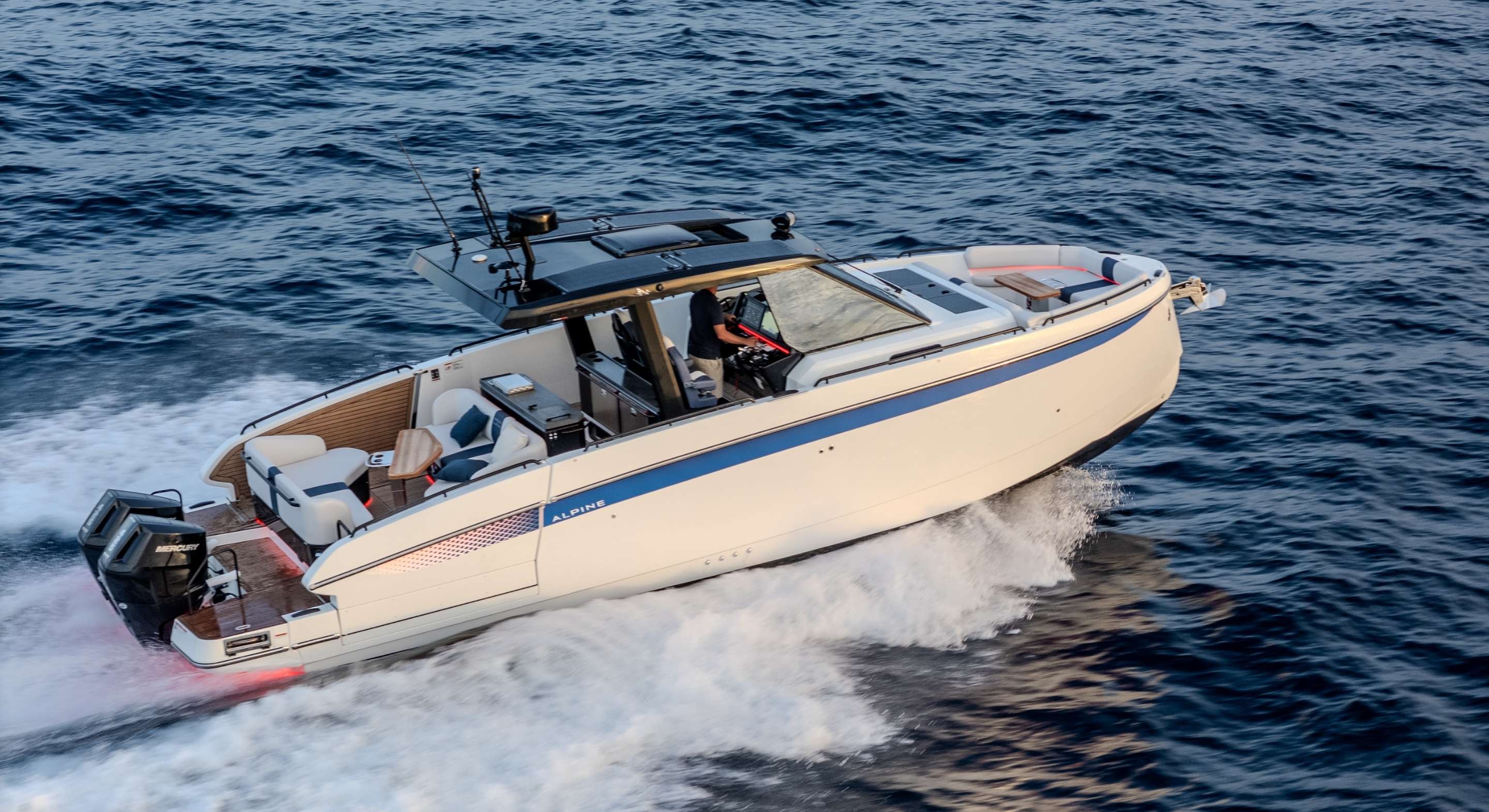 The Gran Turismo 40 Open under way with people aboard