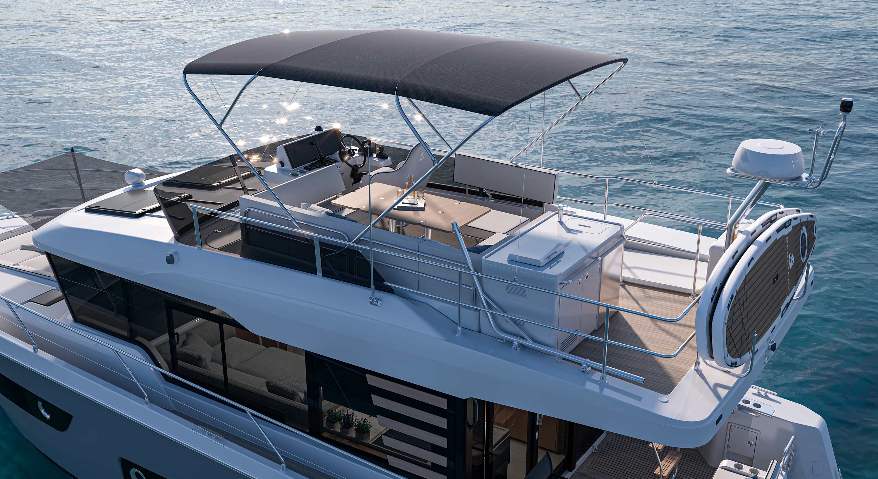 Looking down onto the flybridge helm and seating under the bimini