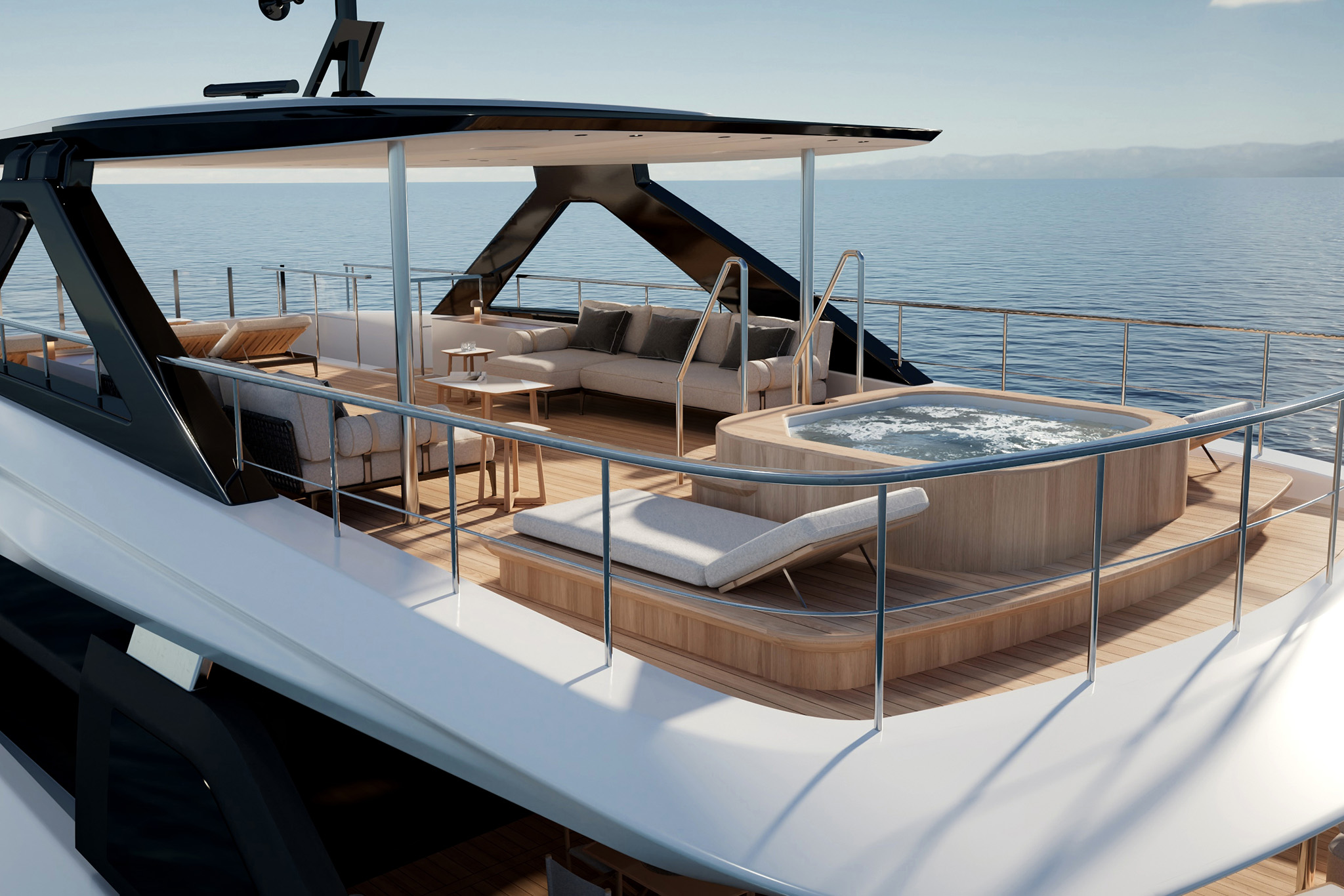 The sun deck under its hardtop, with a corner sofa and low tables on teak, loungers along the side and a spa pool set into the deck aft
