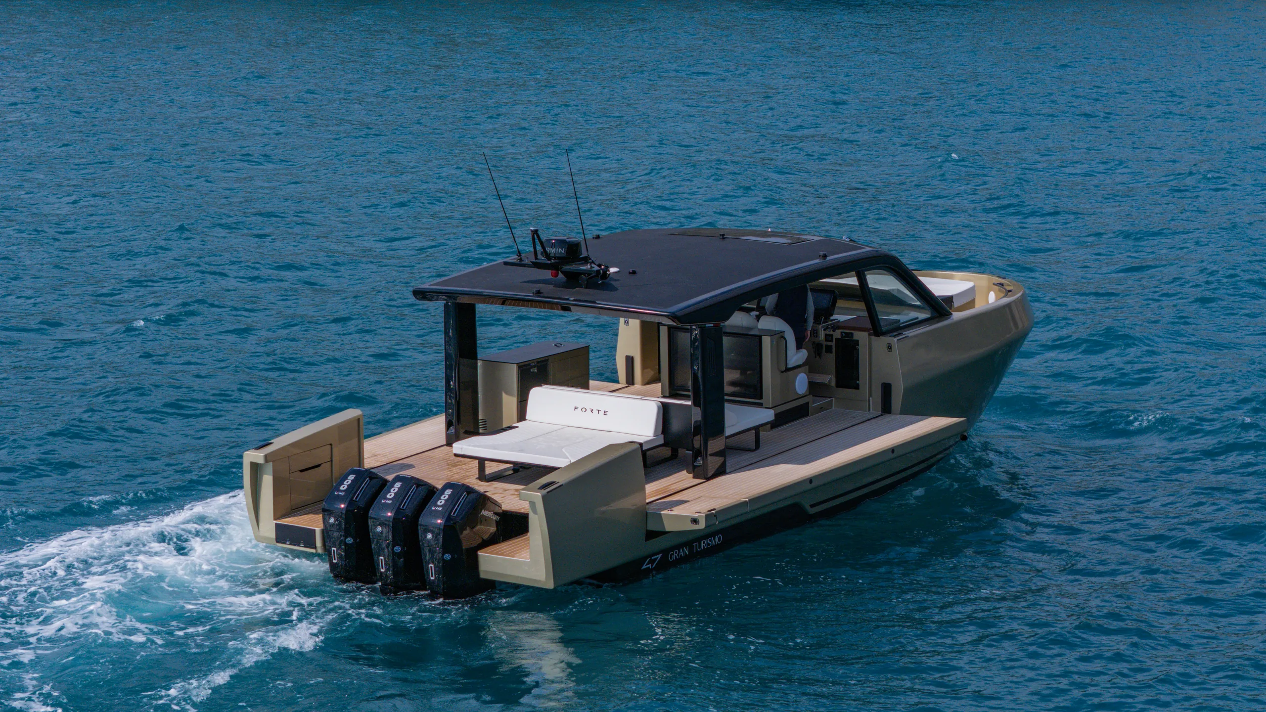 Seen from astern and above, running on three outboards