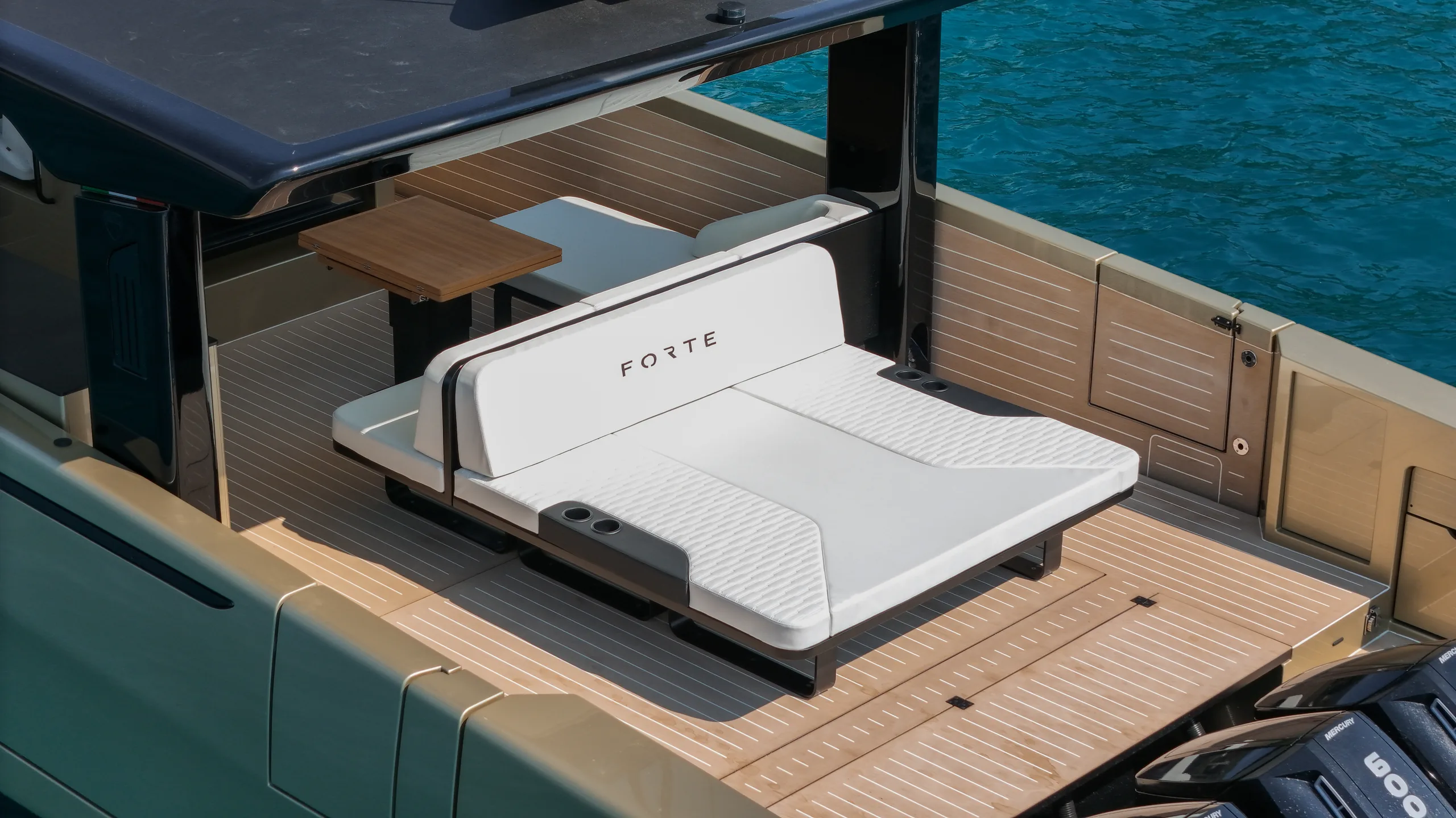 Looking down on the foredeck sunpad and its cushions