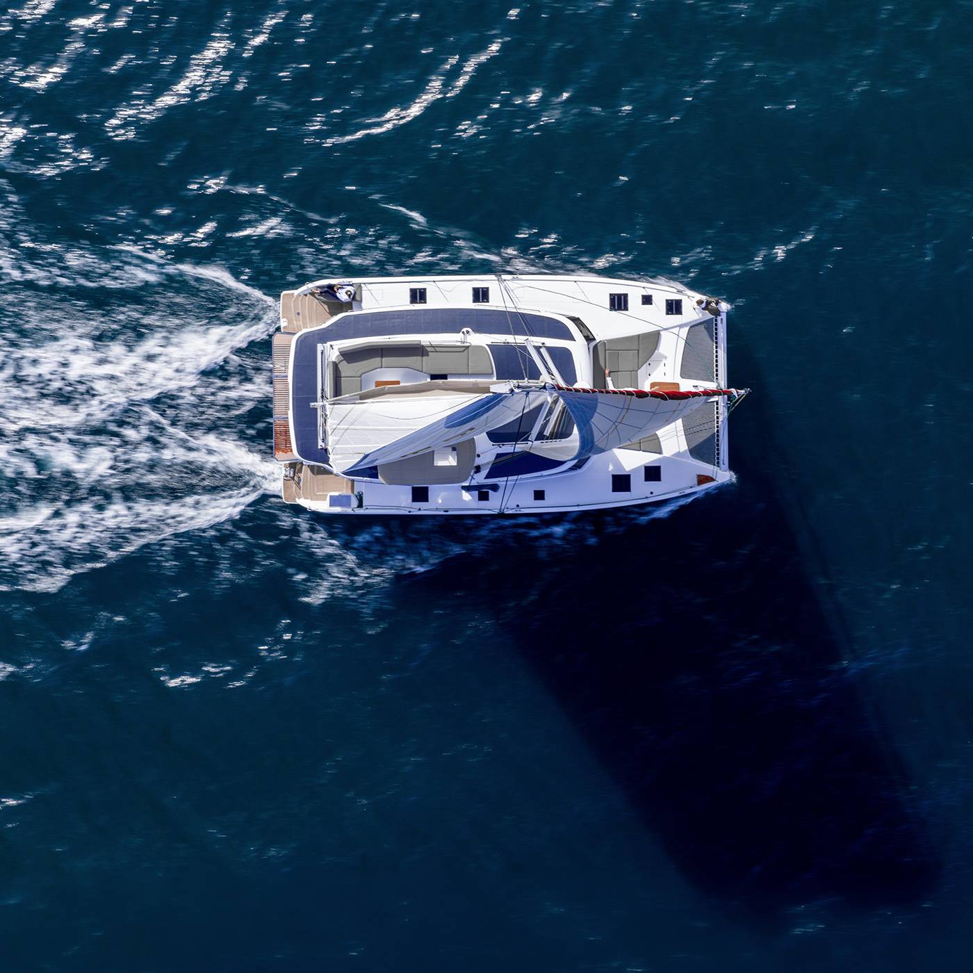 Seen from straight above under way, her wake running astern
