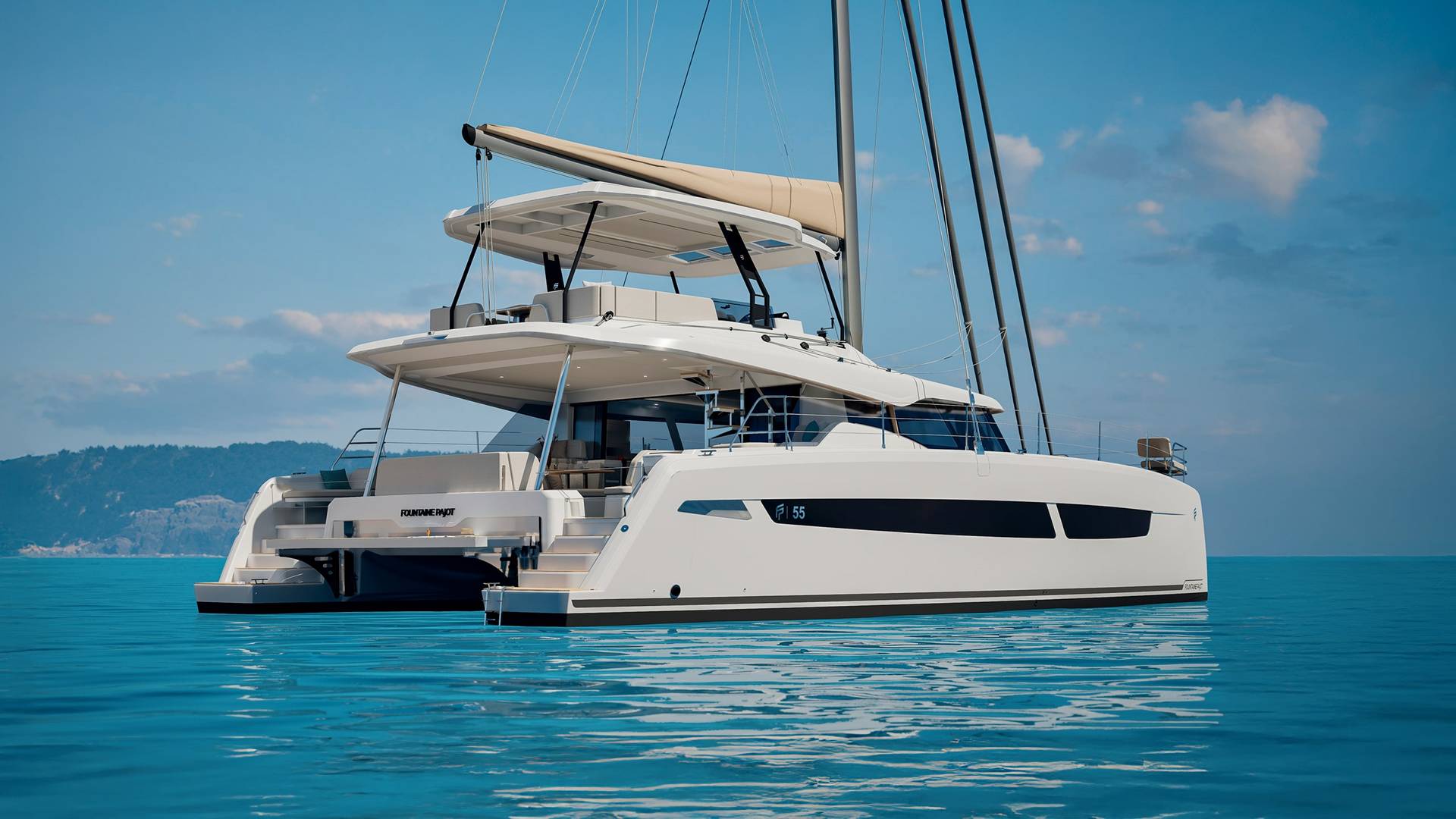 The FP55 in profile on blue water with her sails stowed