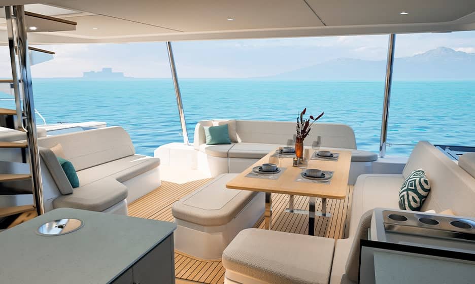 The cockpit table laid for a meal, open to the sea astern