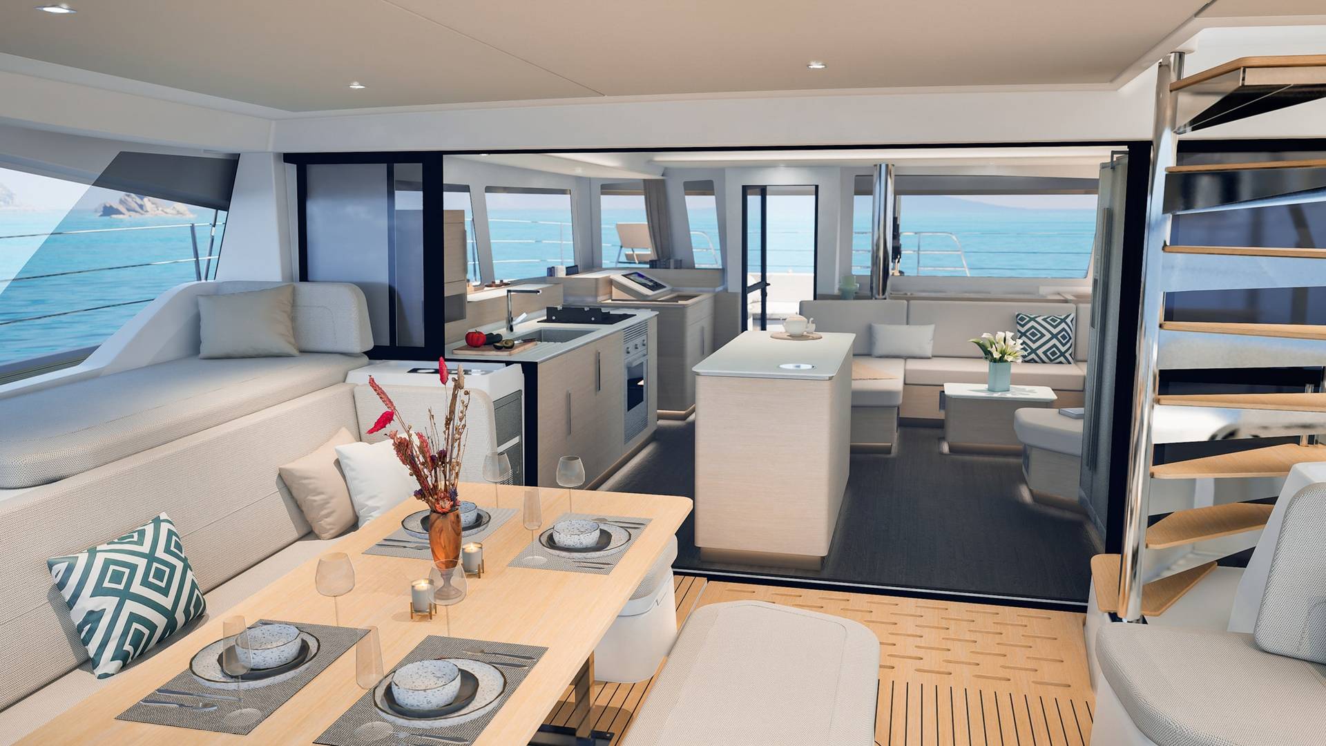 The cockpit dining table with the galley through the doors beyond