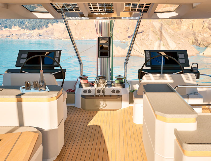 The helm station under the hardtop, twin screens and the throttles to hand