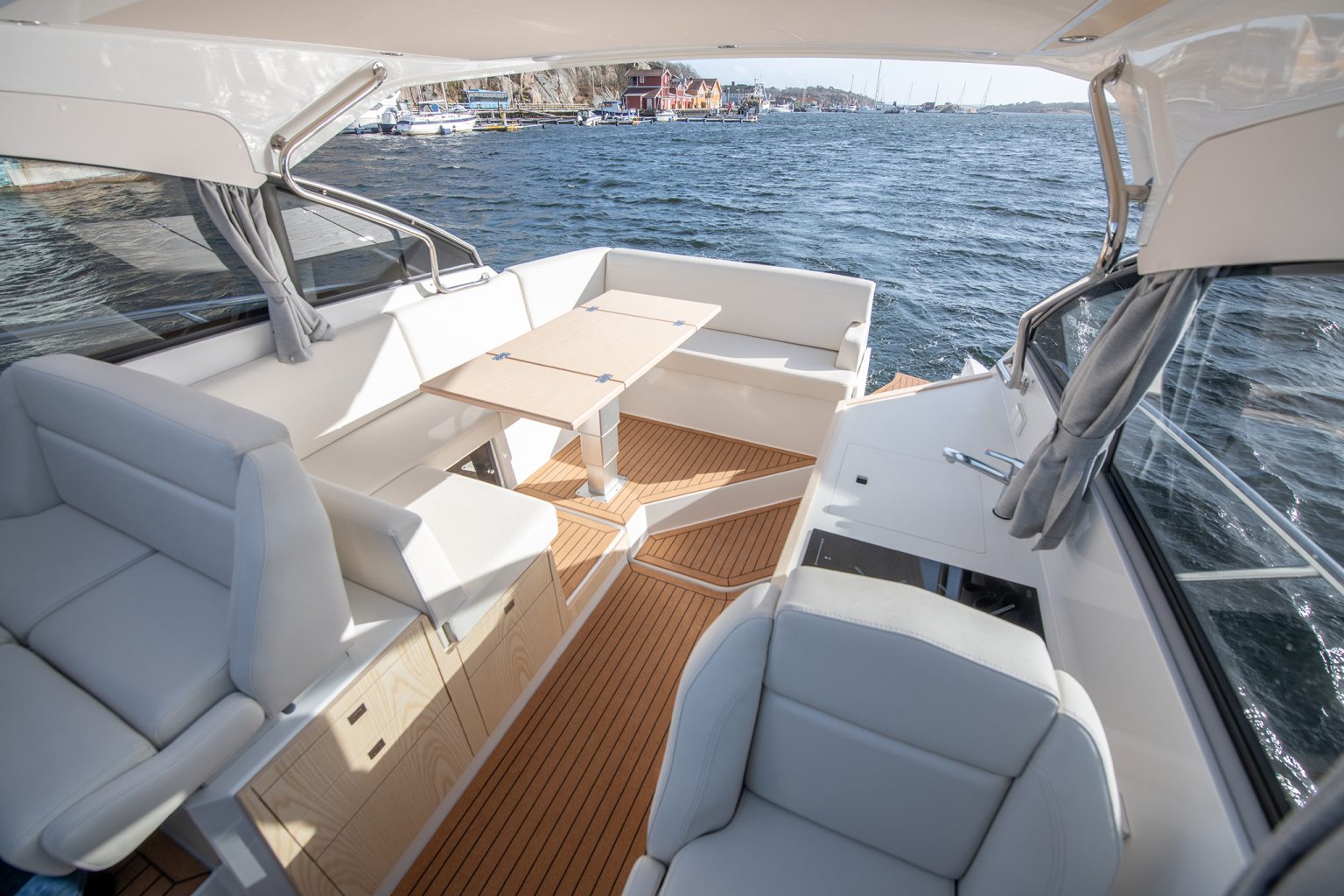 The cockpit seating and table under the hardtop