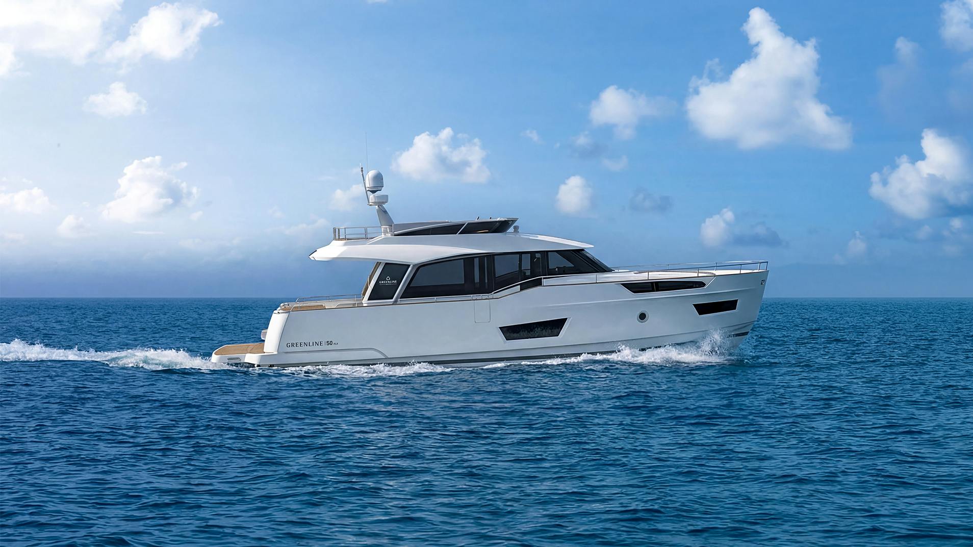 The 50 Fly in profile under way, showing the flybridge and the long deckhouse windows