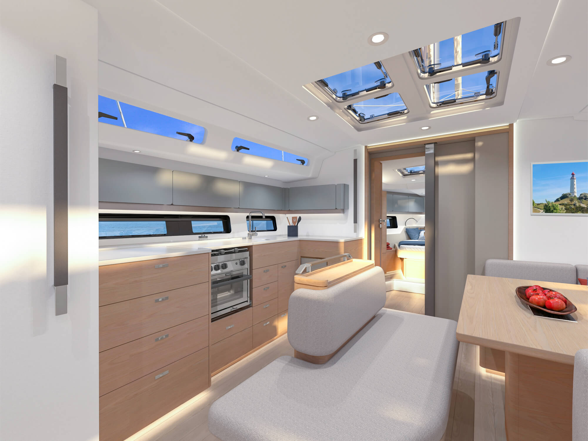 The galley along the port side, with oven, sink and hull windows