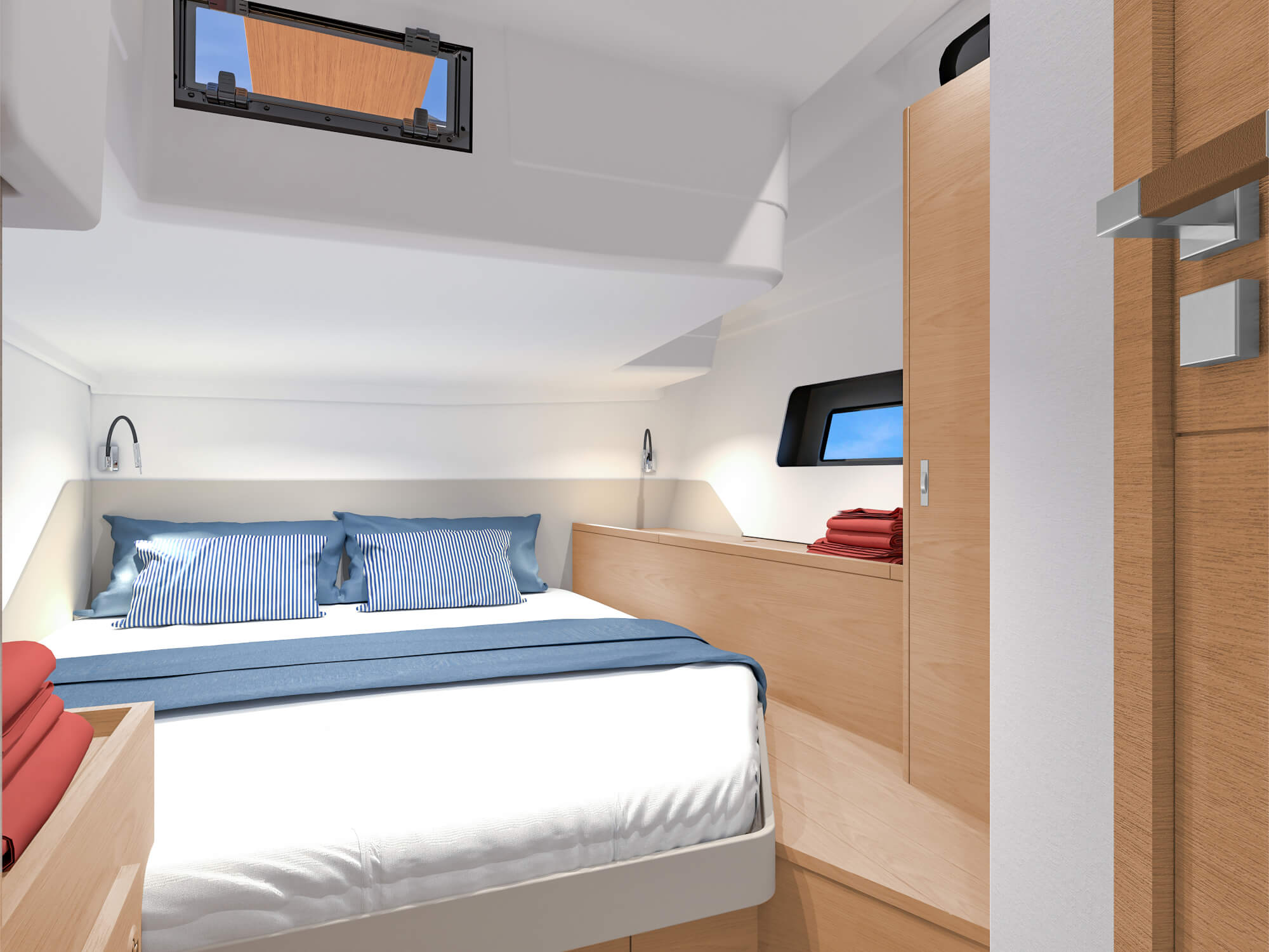 An aft guest cabin with a double berth and a hull window