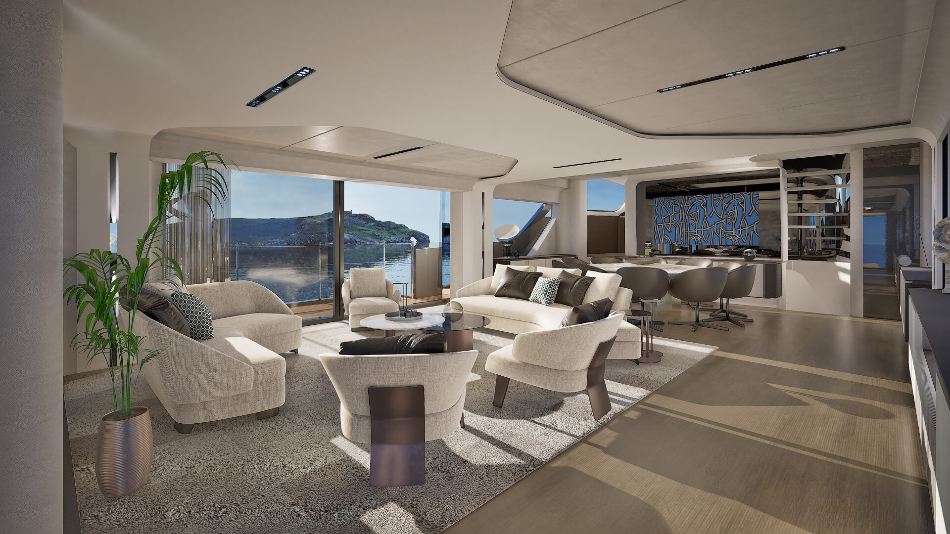 The main deck saloon looking aft towards the open stern, with armchairs, a dining table and a planter