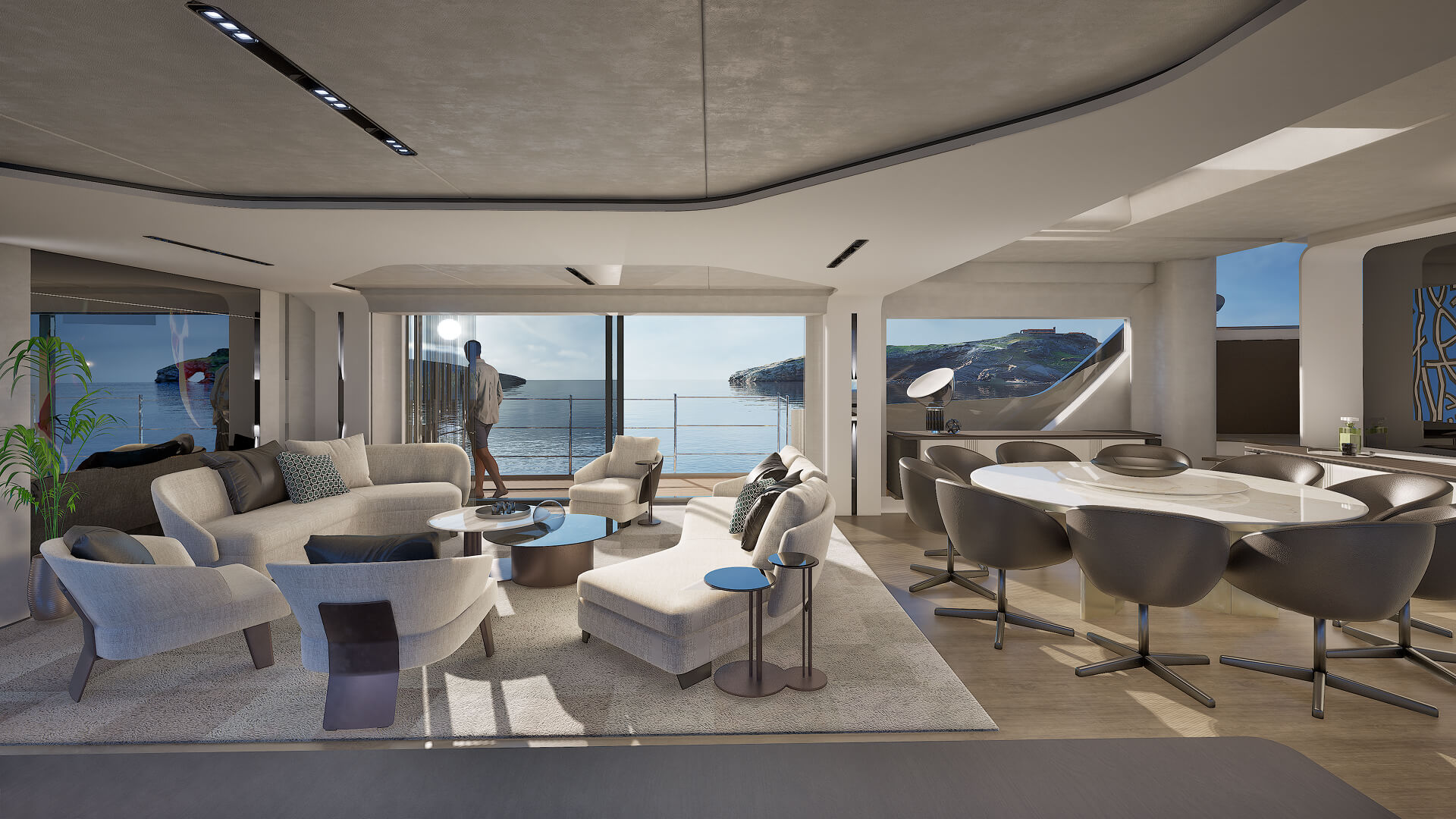 The saloon arranged as two lounge areas, with floor-to-ceiling windows down both sides