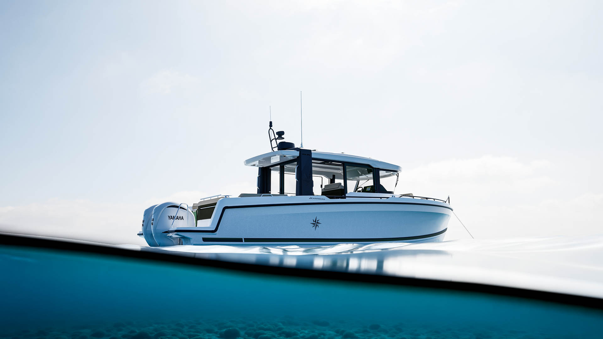 The EX 34 Cabin in profile over clear shallow water, the glass wheelhouse closed