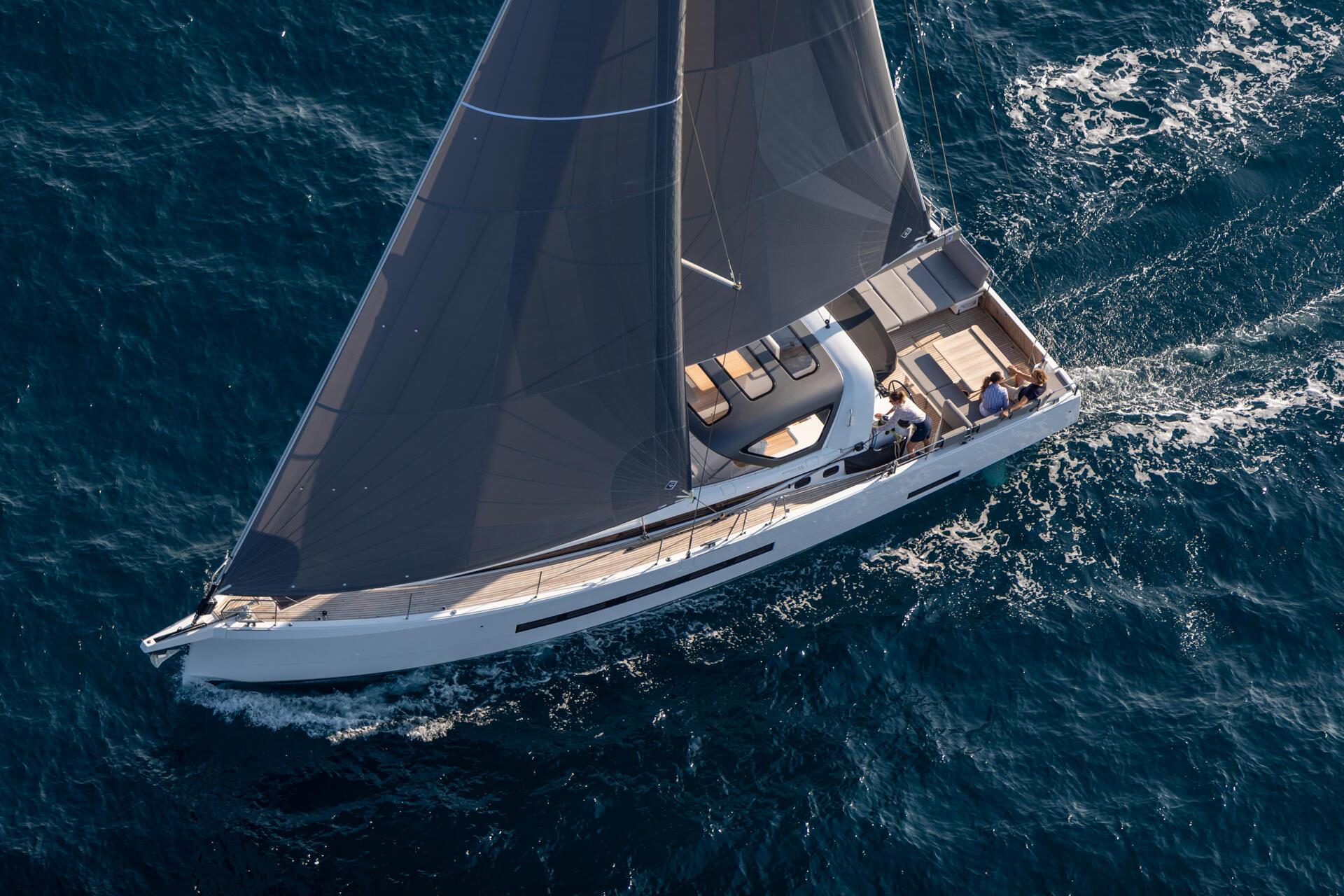 Seen from above under way, guests spread along the side deck