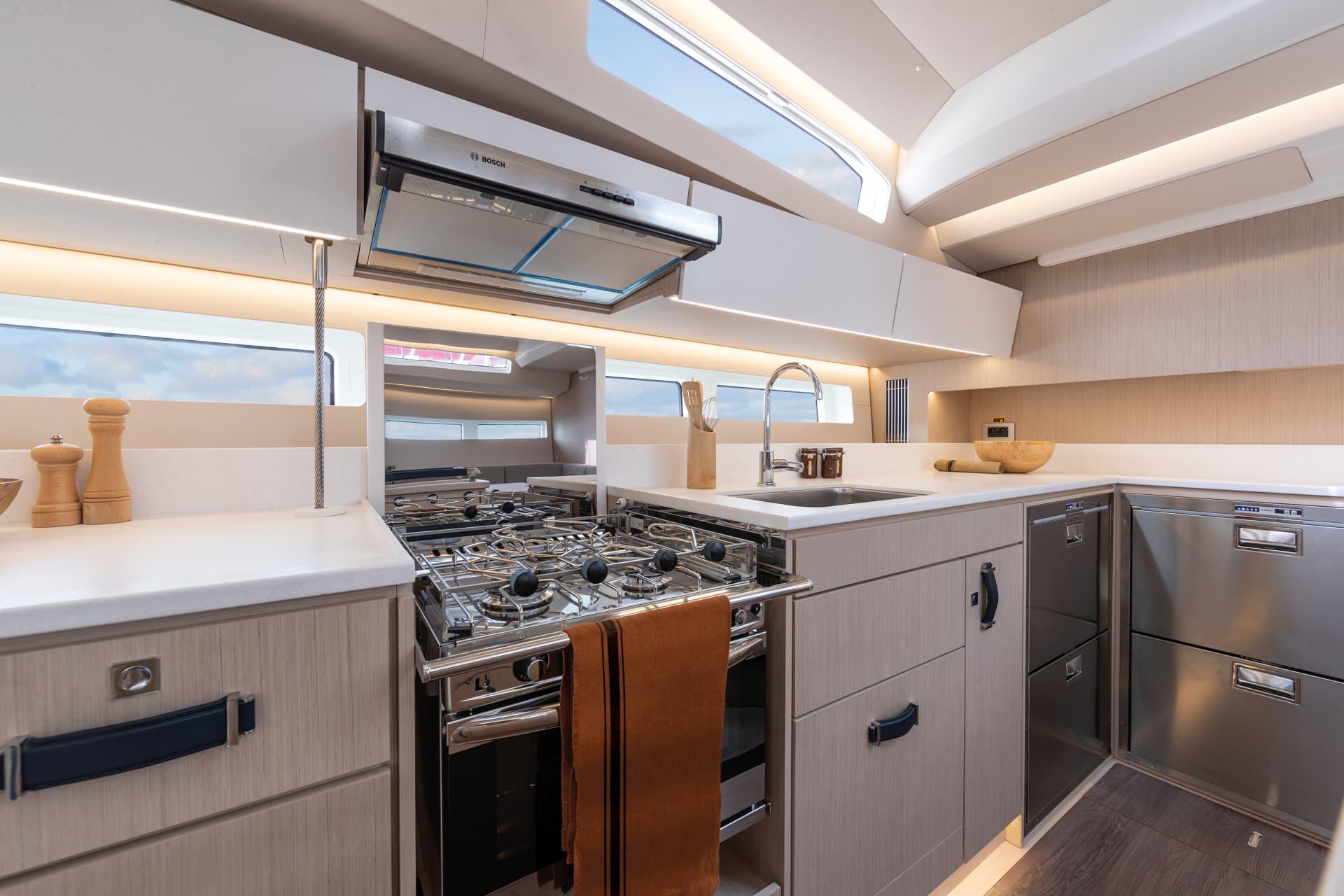The galley with a gimballed cooker, an oven and a double sink