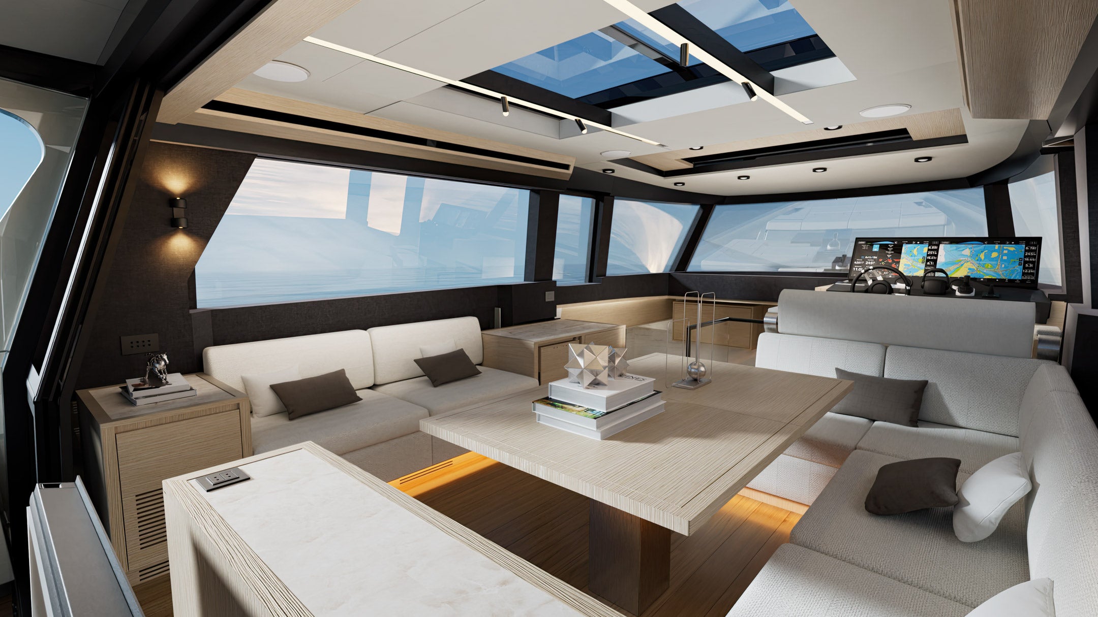 The saloon looking forward to the helm, with skylights overhead and glazing all round
