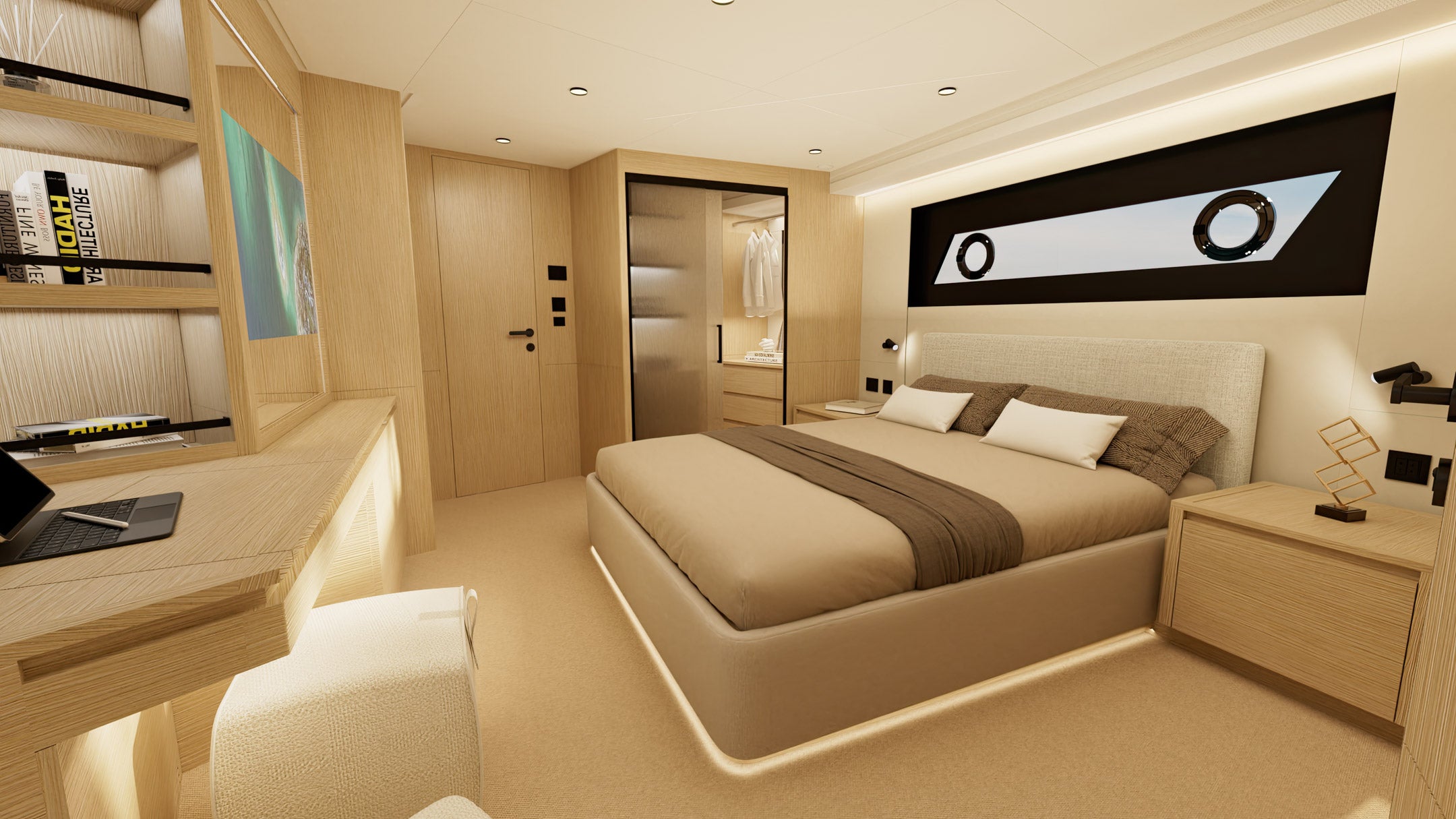 A cabin with a double berth, a hull window and a doorway through to the heads
