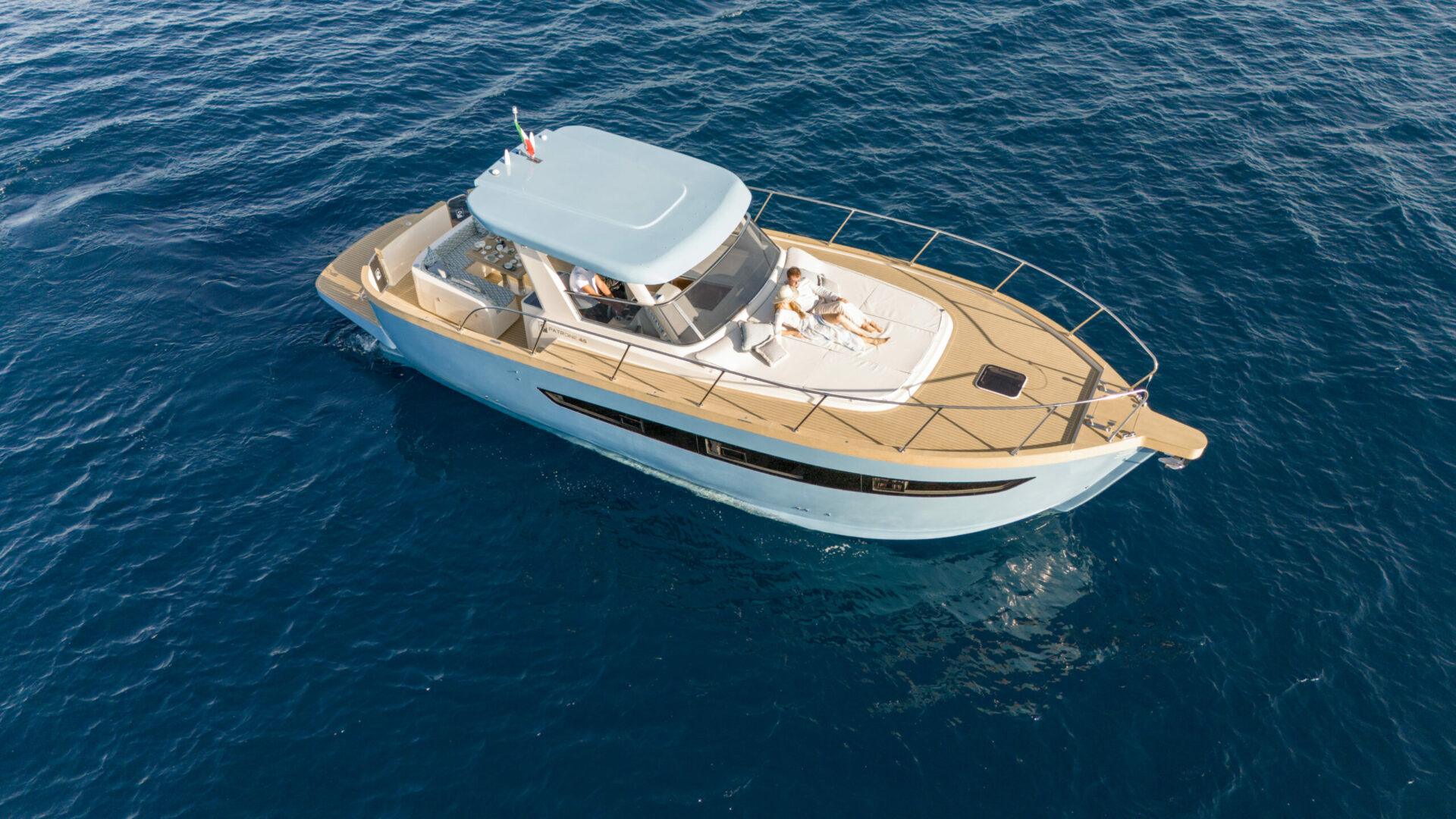 The 45 seen from above and astern, with the cockpit dinette in view