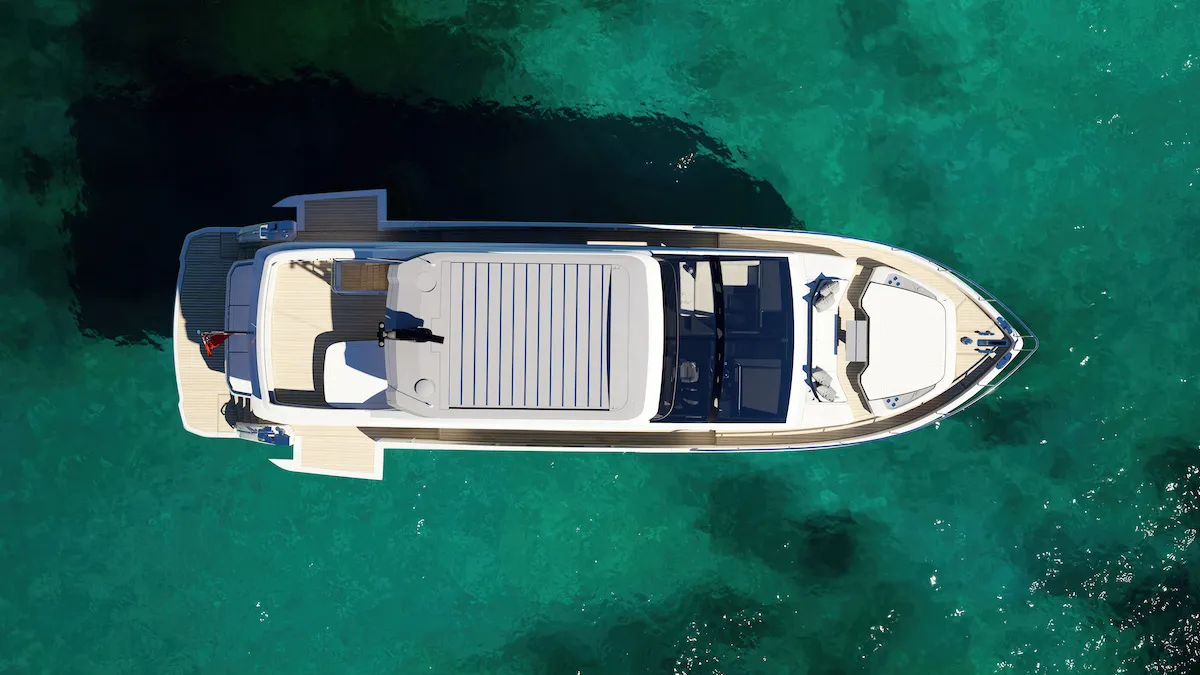 The 73 from directly above over dark green water, with the sunpads laid out