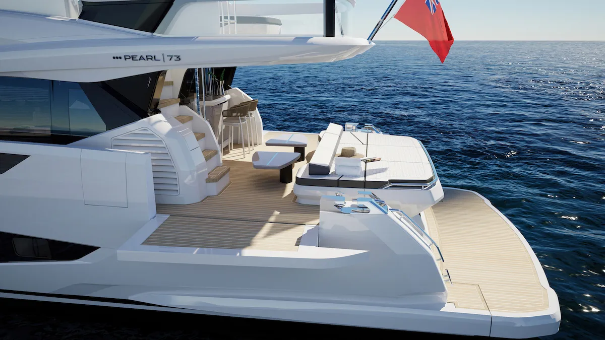The aft deck with a fold-down balcony open over the water