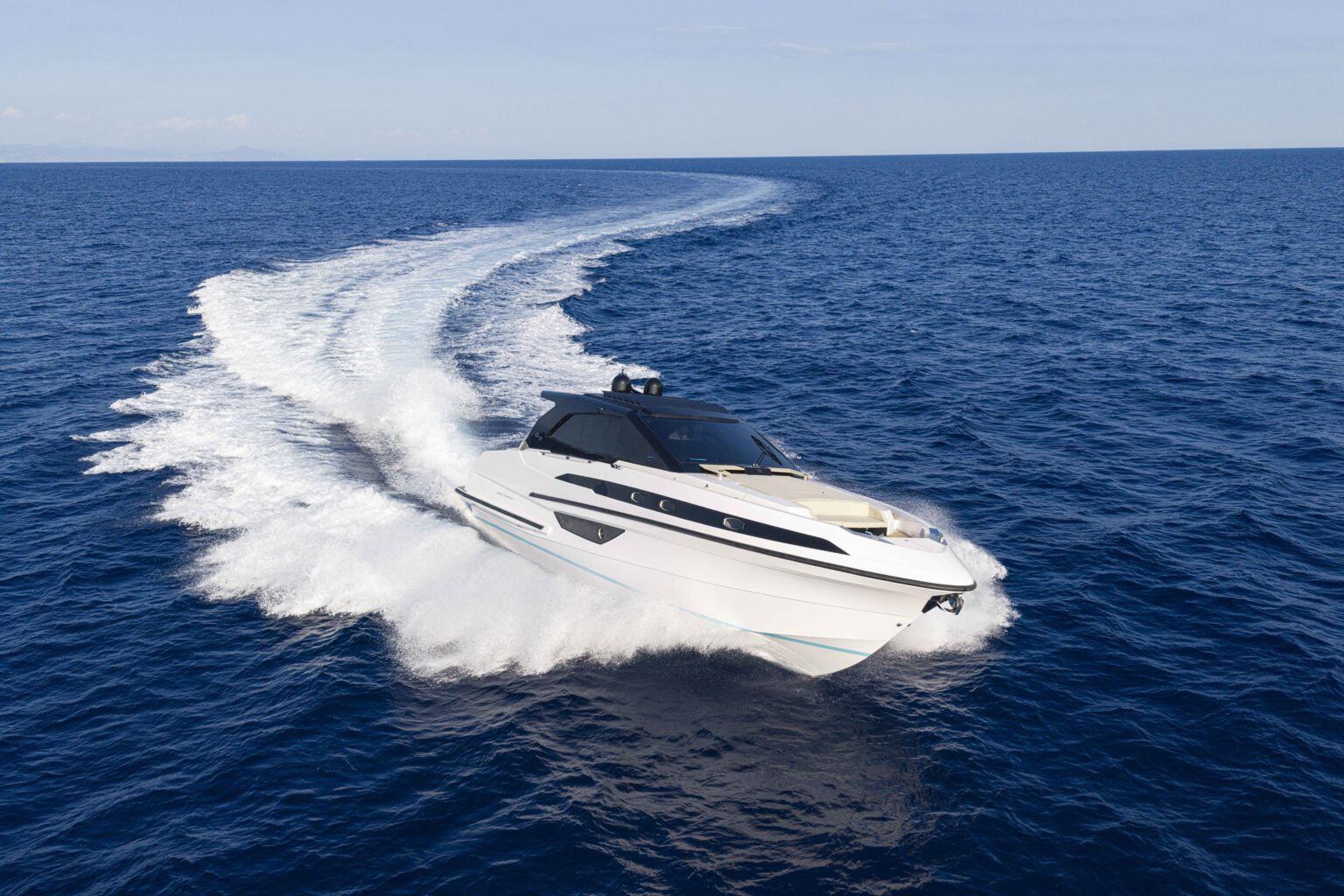 The Sport Coupé 50 carving a wide turn, seen from above