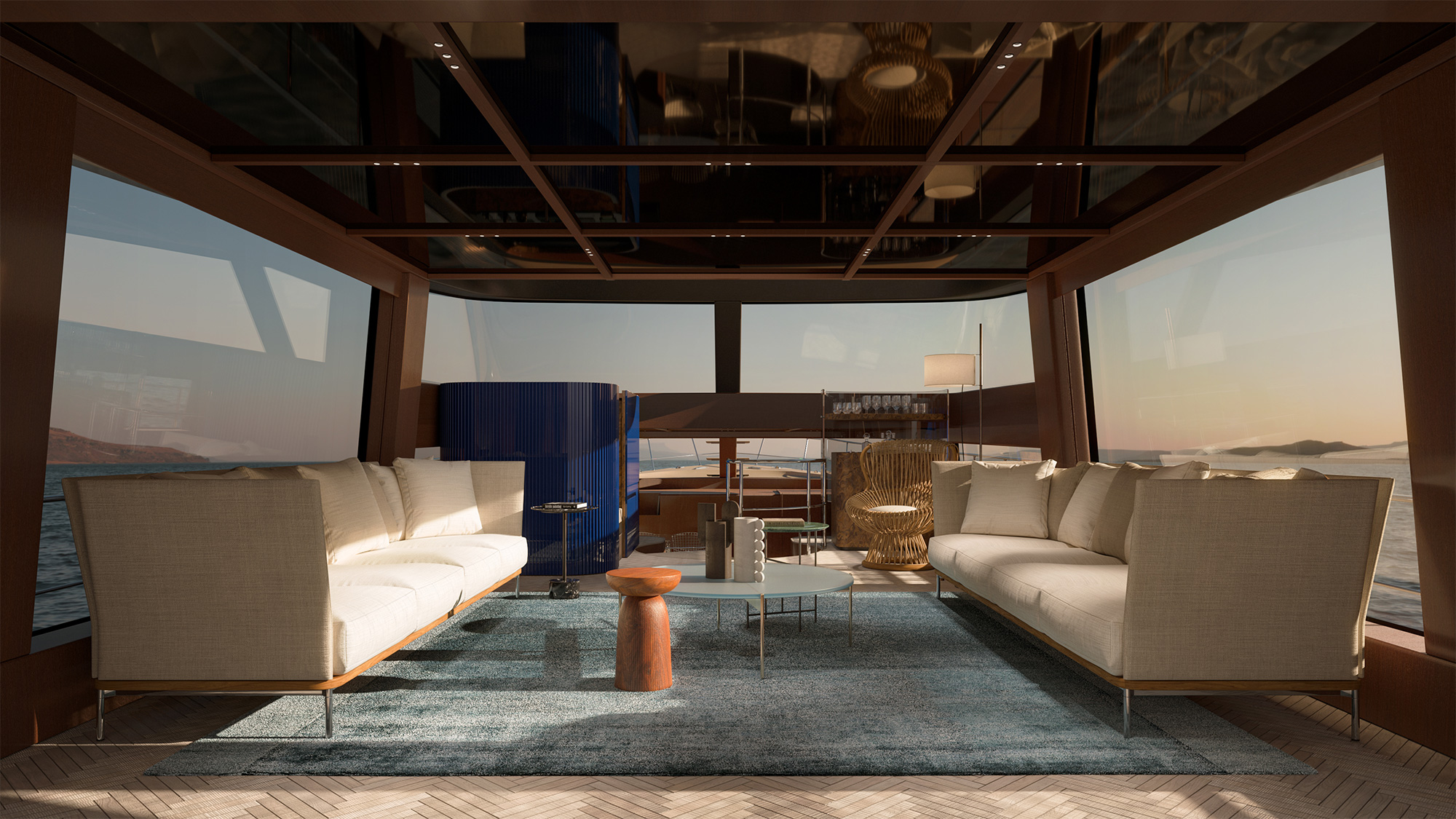 The saloon, with two facing sofas and glazing on both sides
