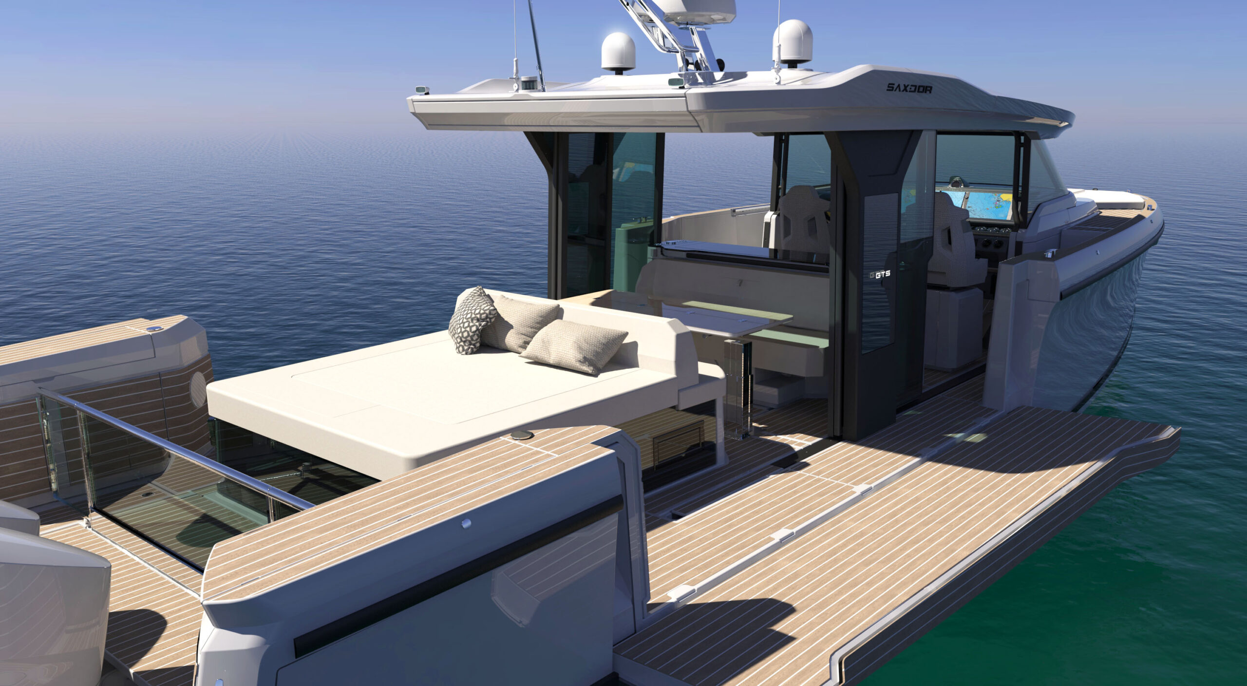 The aft deck sunbed and the cockpit behind it, looking forward