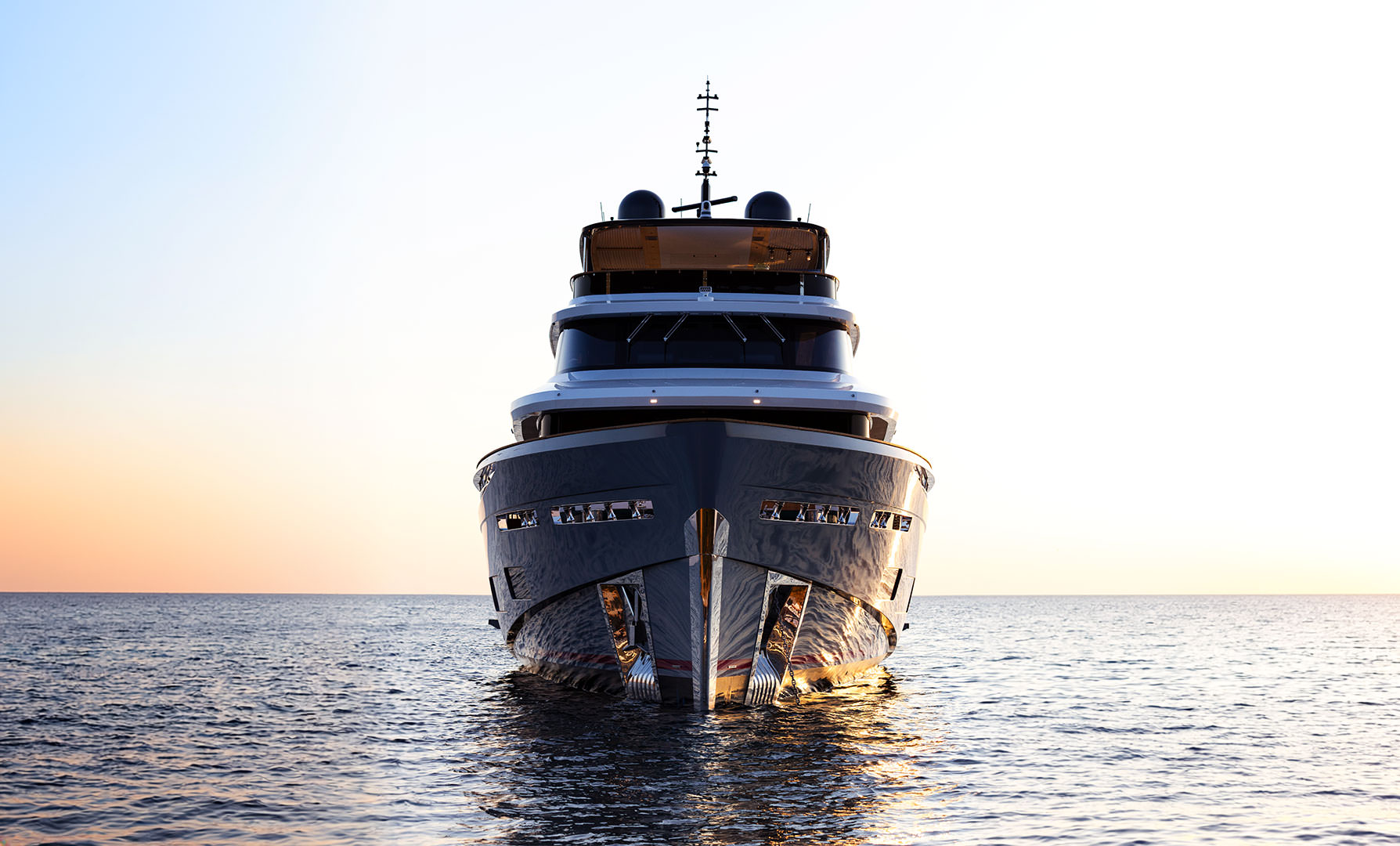 The 118 head-on at sunset, showing the axe bow