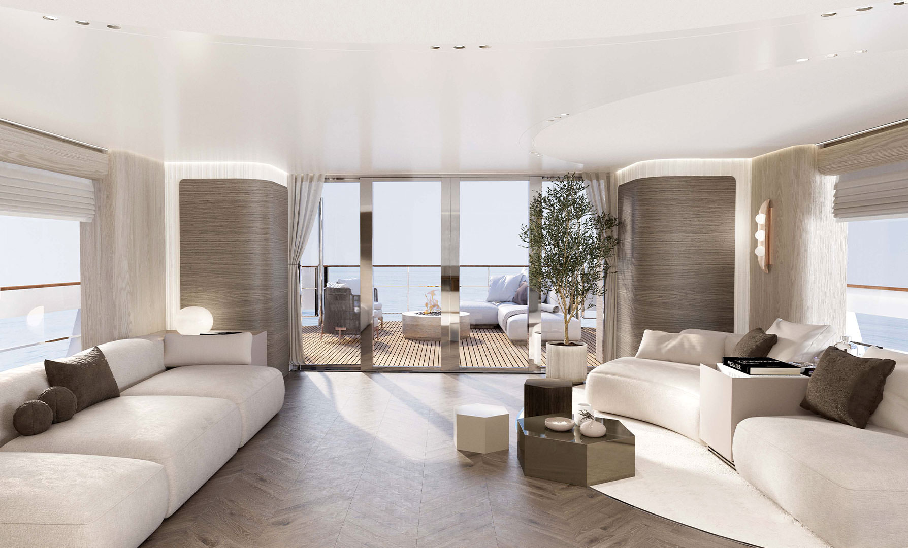 A saloon with sofas along both sides and full-height glass aft