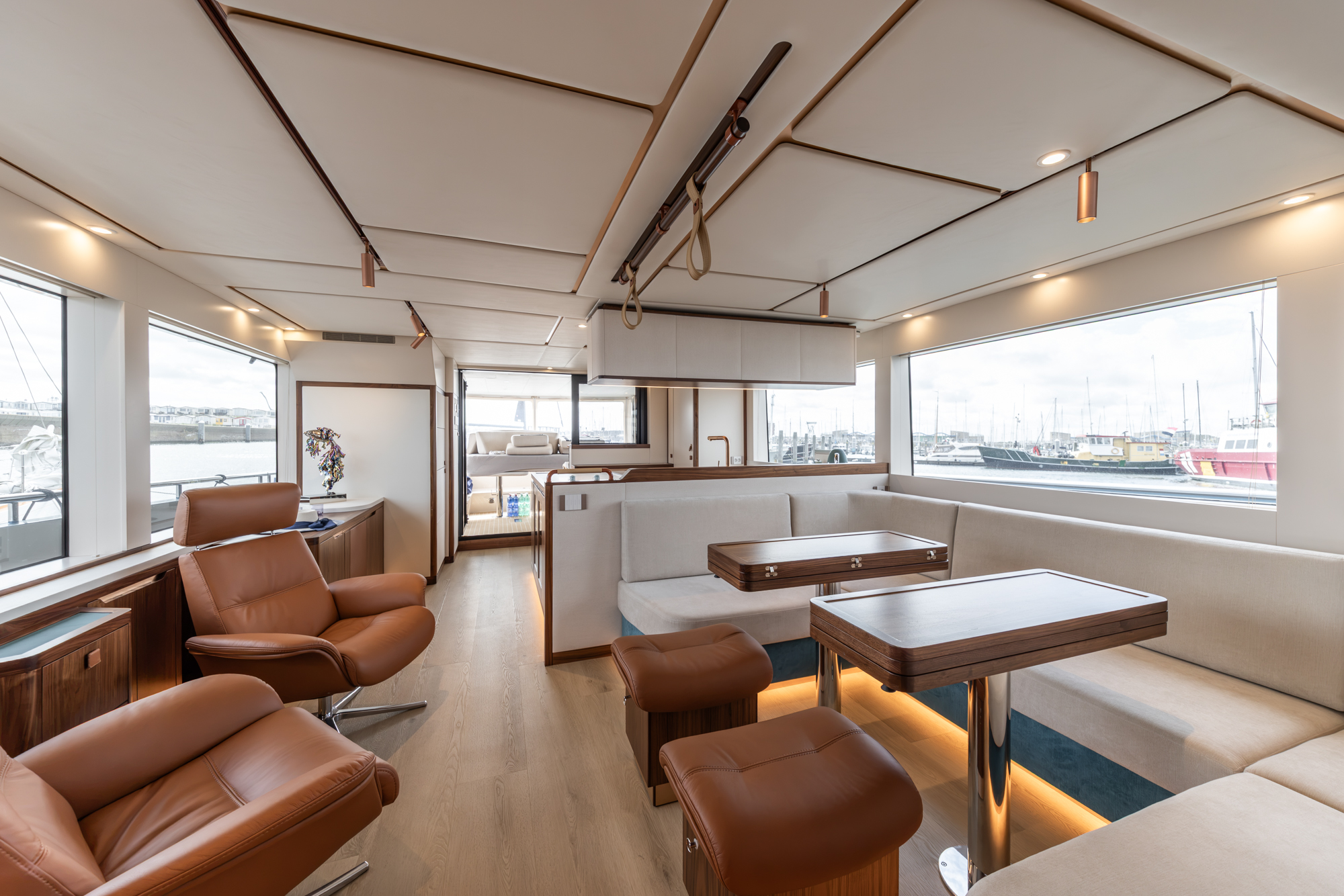 The same saloon looking aft, with the galley and a window onto the side deck