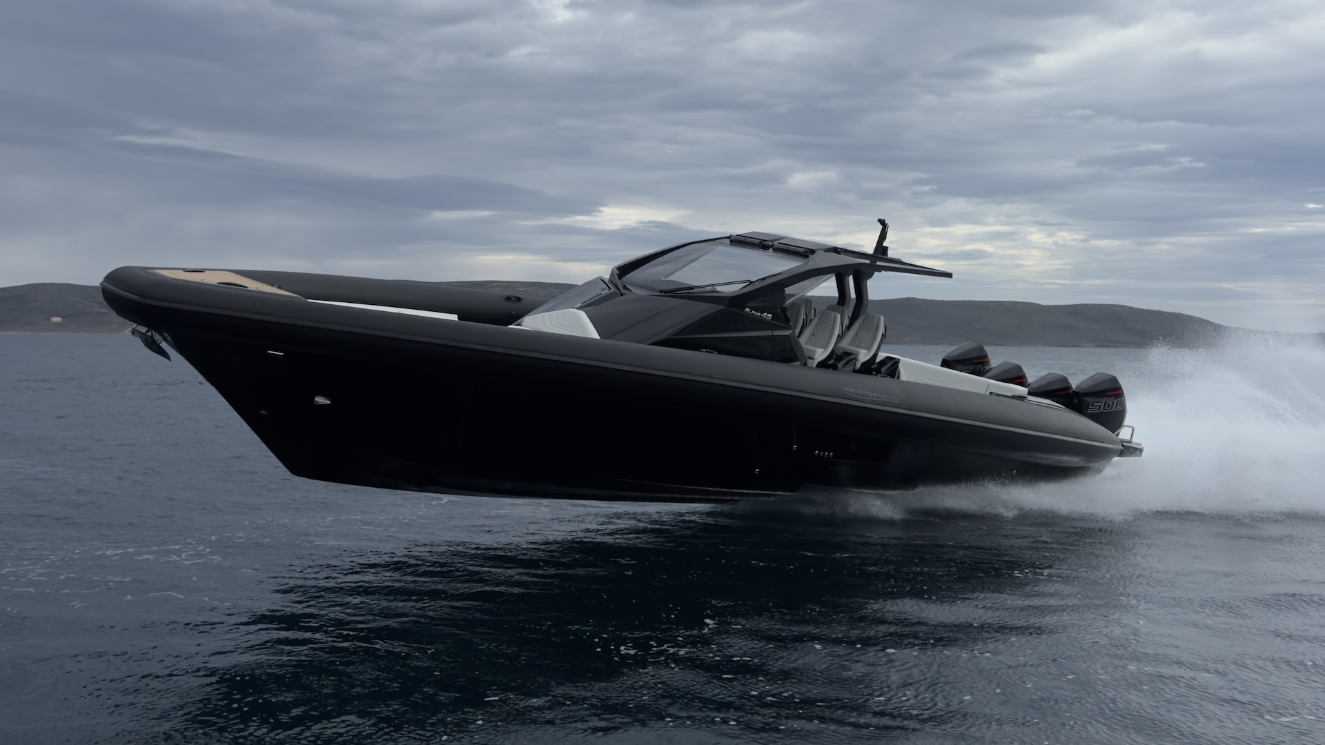 The Alpha 45 running fast with its high bow lifted clear of the water