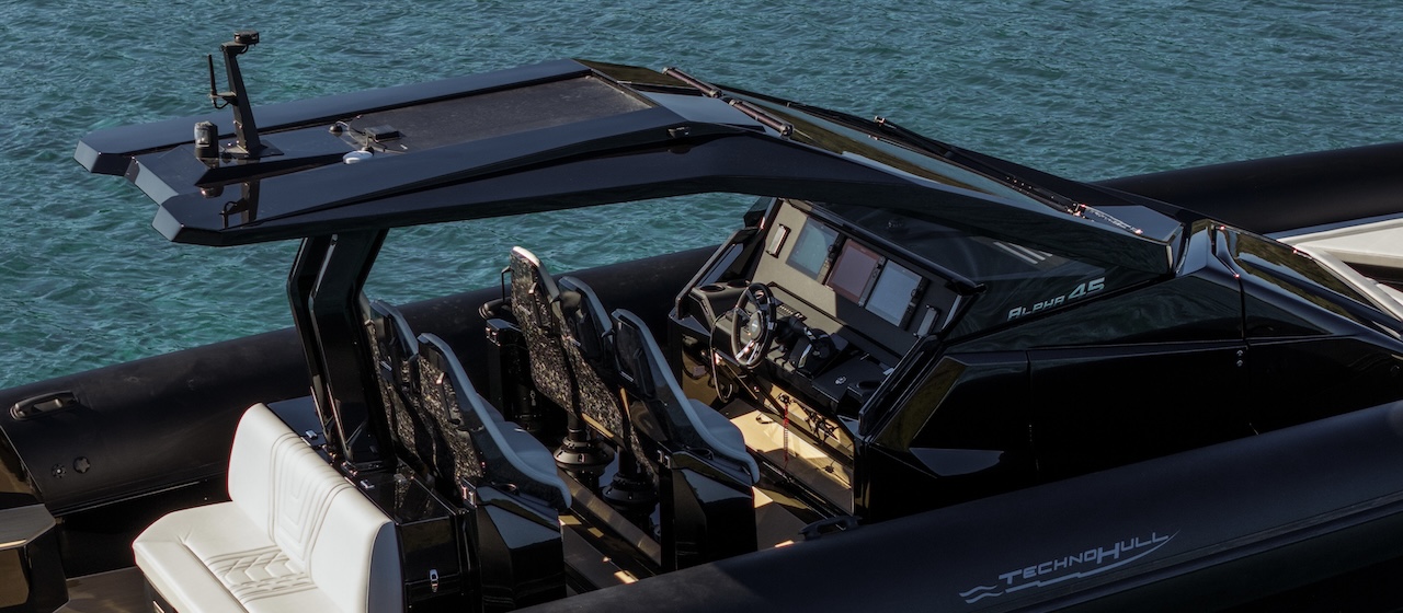 The hardtop over the helm seats, with the Alpha 45 name on the console