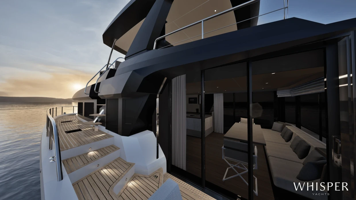 The side deck at sunset, looking forward past the glazed saloon