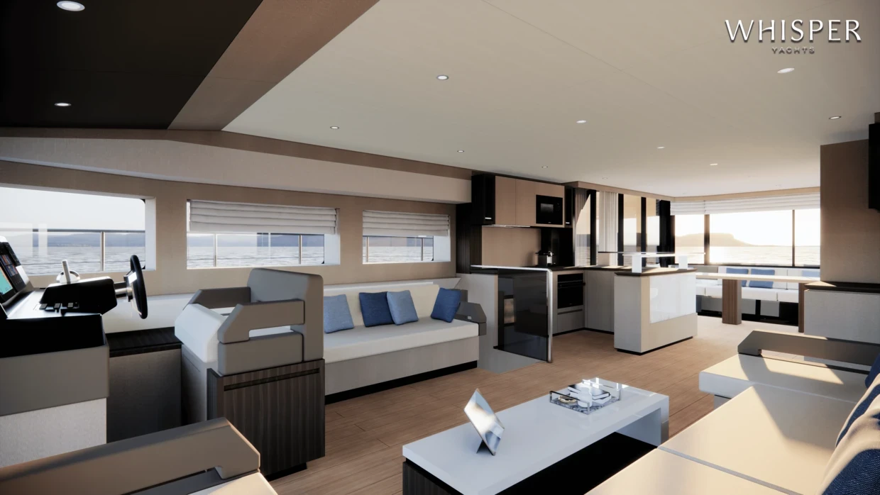 The saloon from the other end, with seating, a coffee table and the helm forward