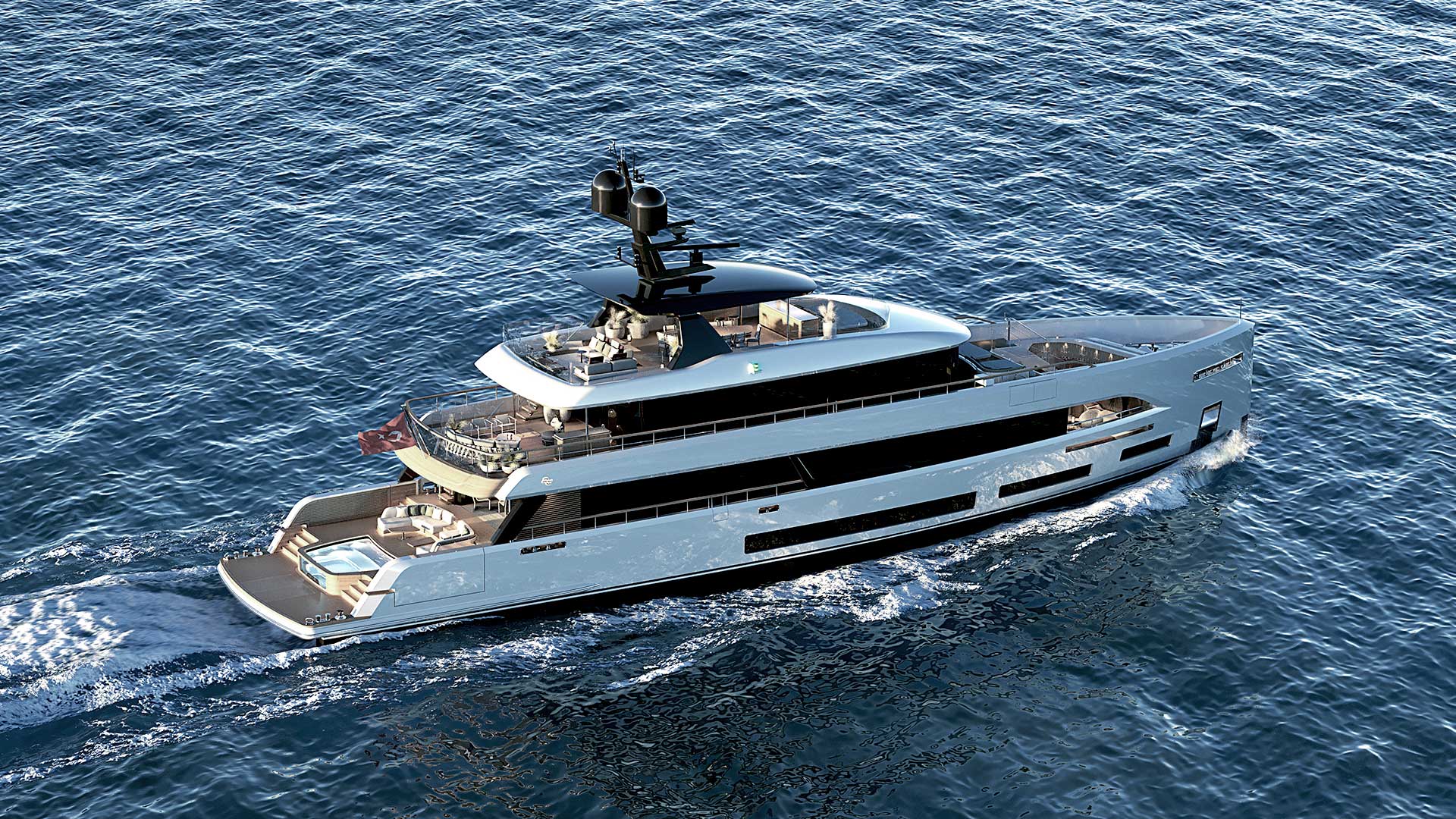 The 42M under way seen from above and astern, showing the stepped aft decks and the pool on the lower deck